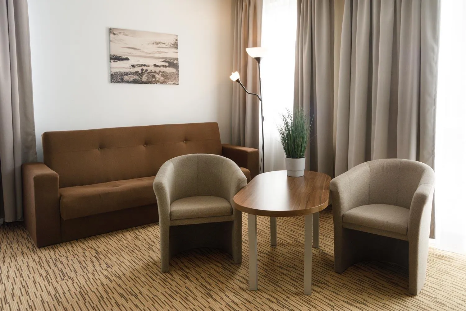 Seating area in Holiday Golden Resort & Spa