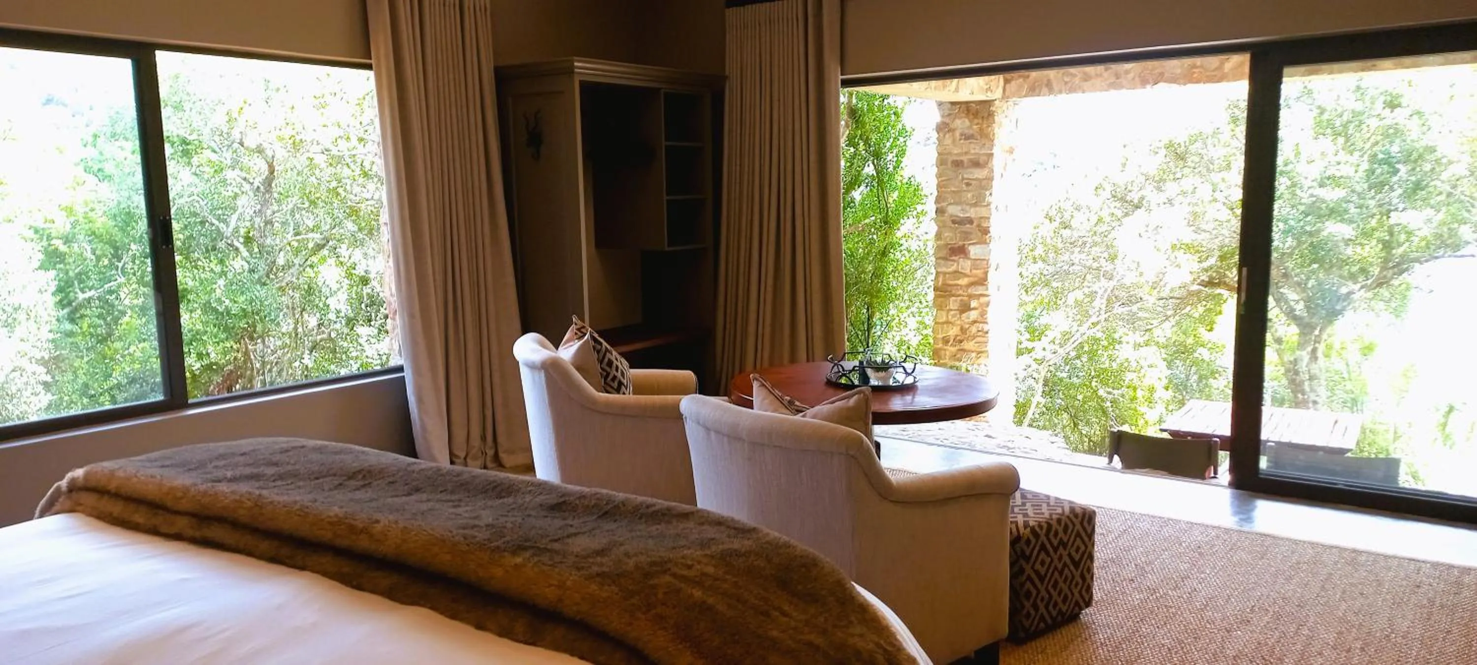 Seating area, Bed in African Safari Lodge