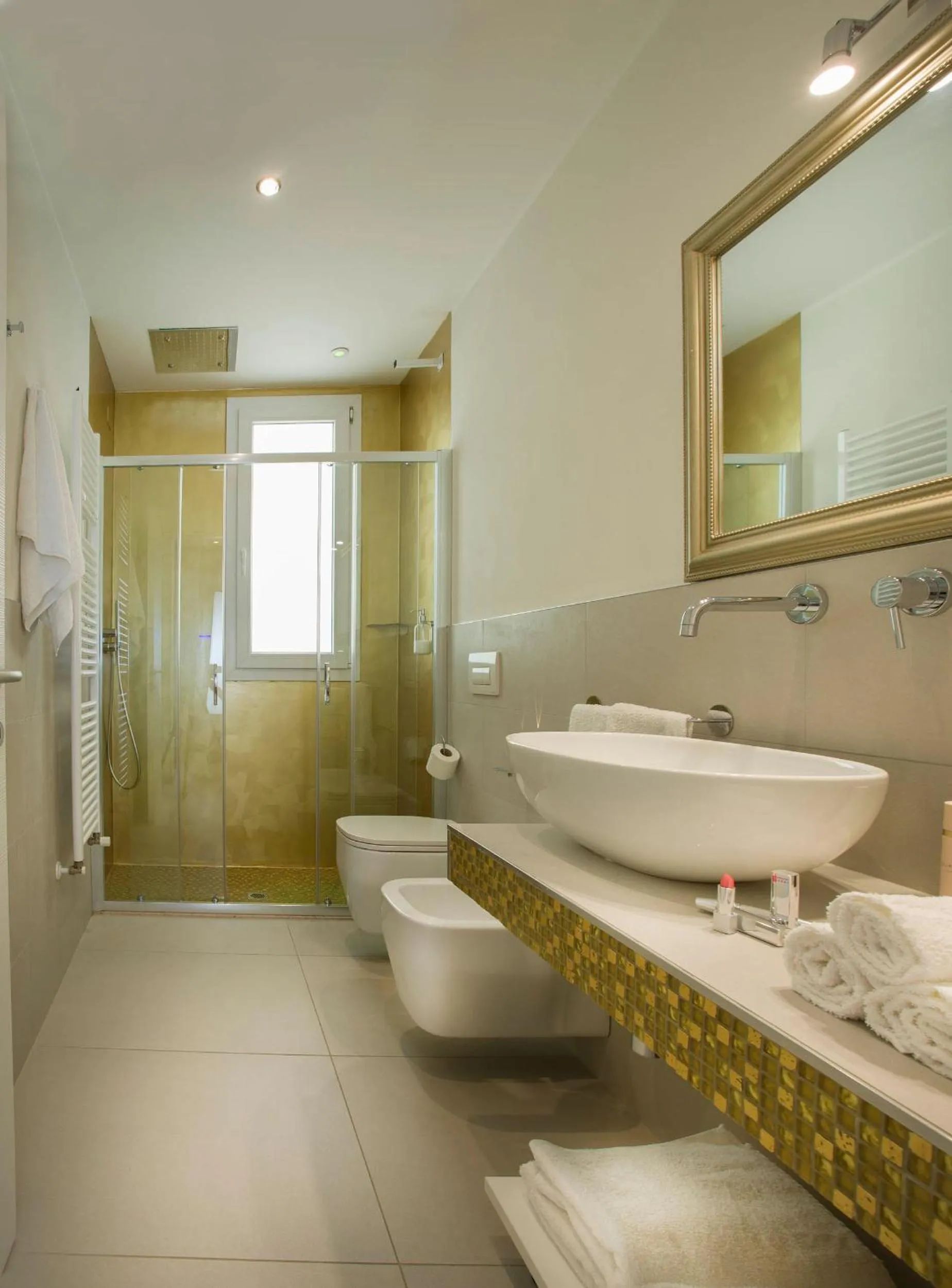 Toilet in White Suite & Apartments