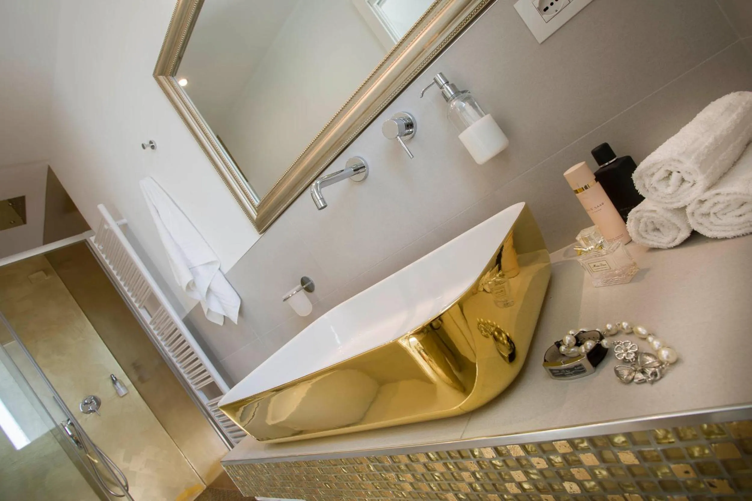 Bathroom in White Suite & Apartments