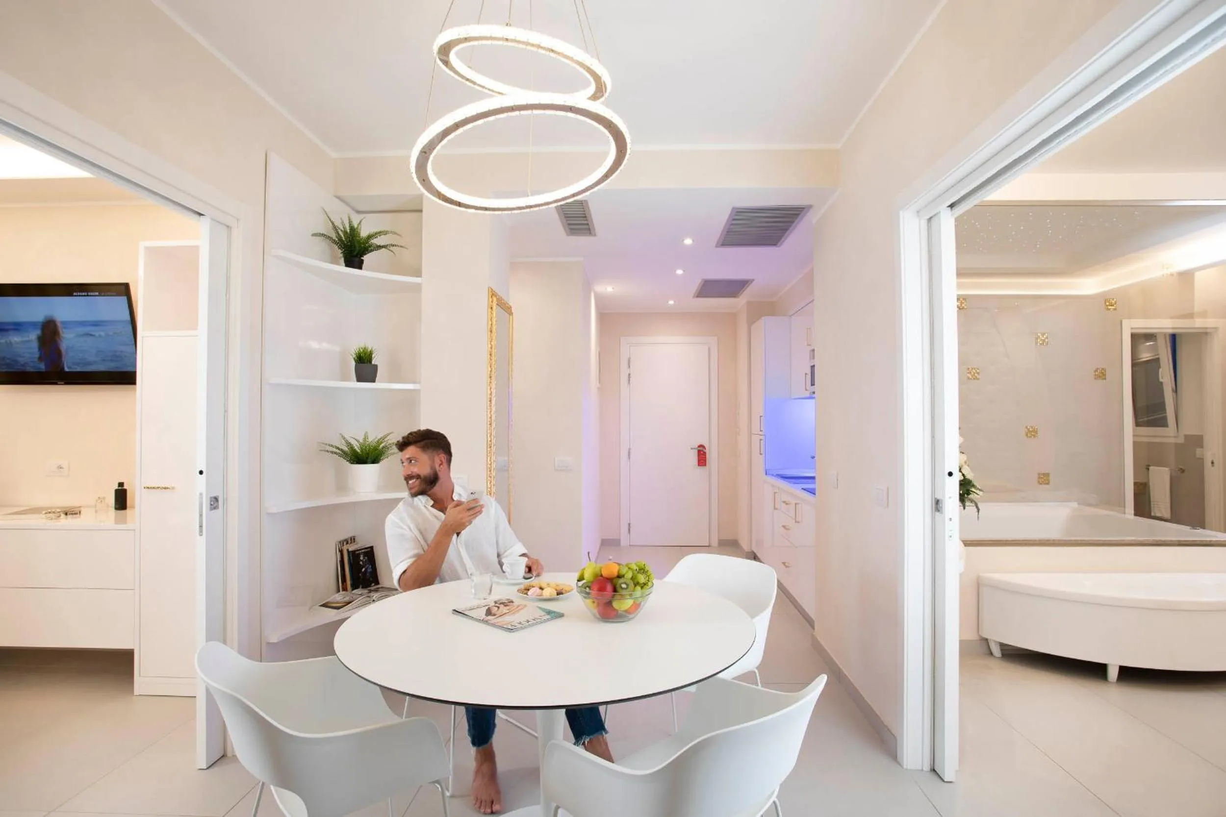 Bed in White Suite & Apartments