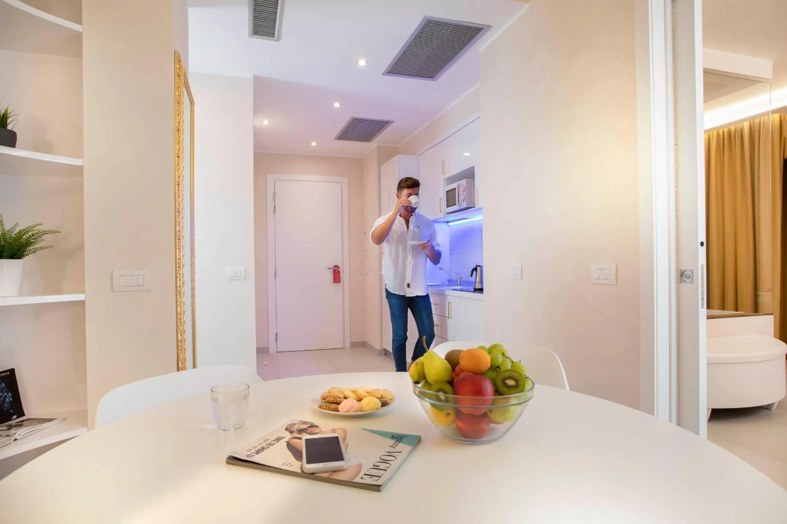 Bed in White Suite & Apartments