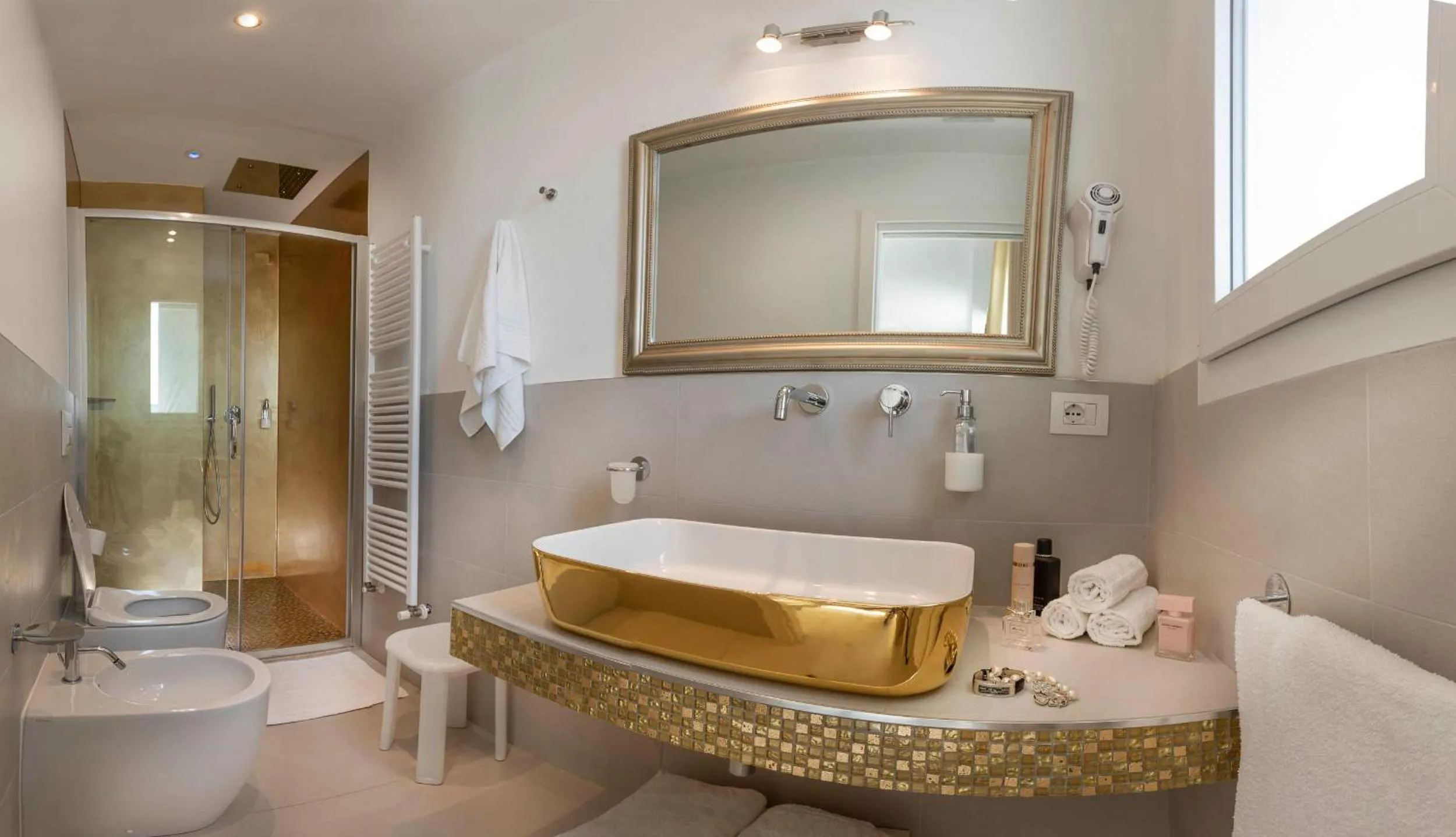 Shower in White Suite & Apartments