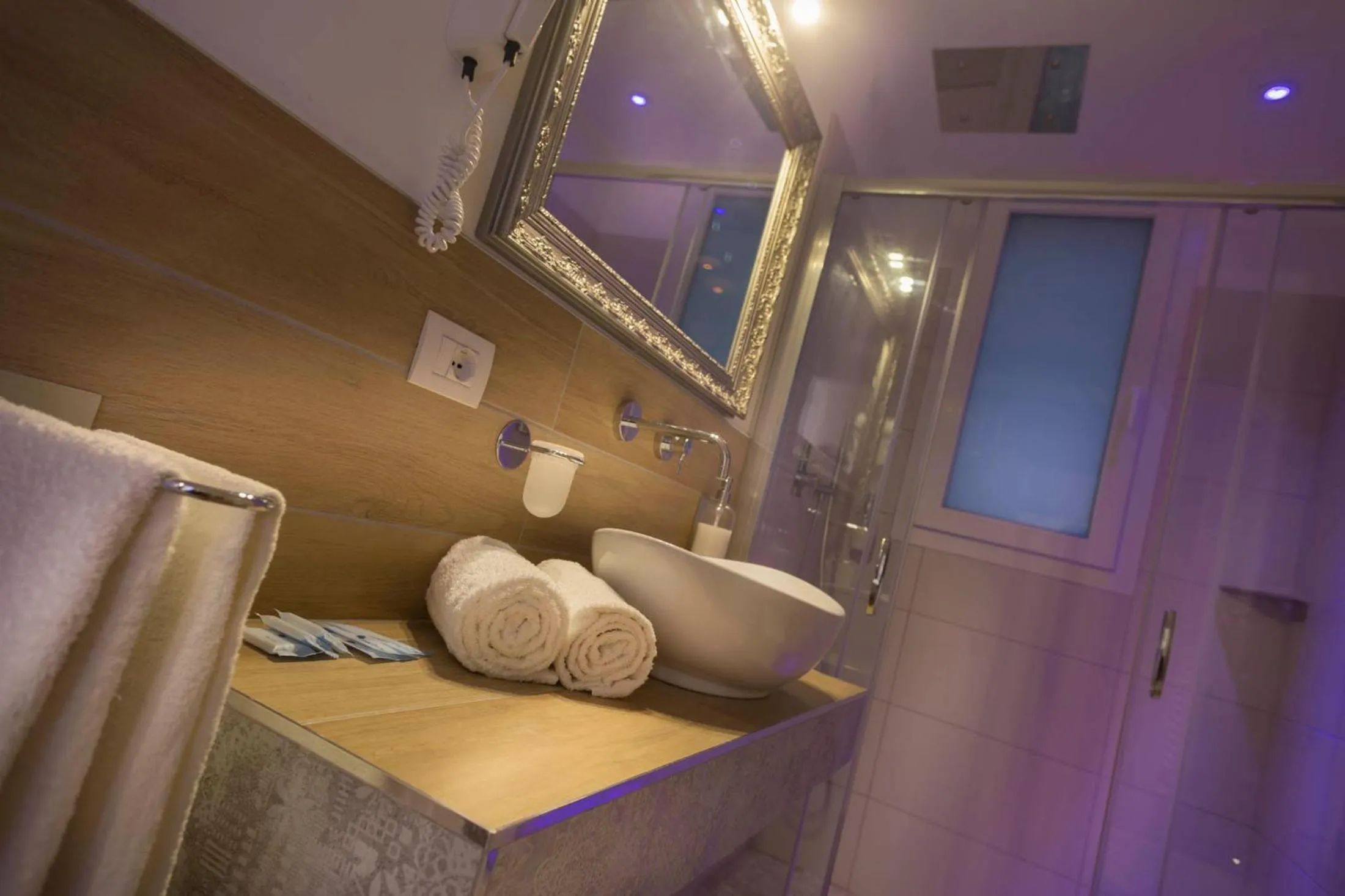 Shower in White Suite & Apartments