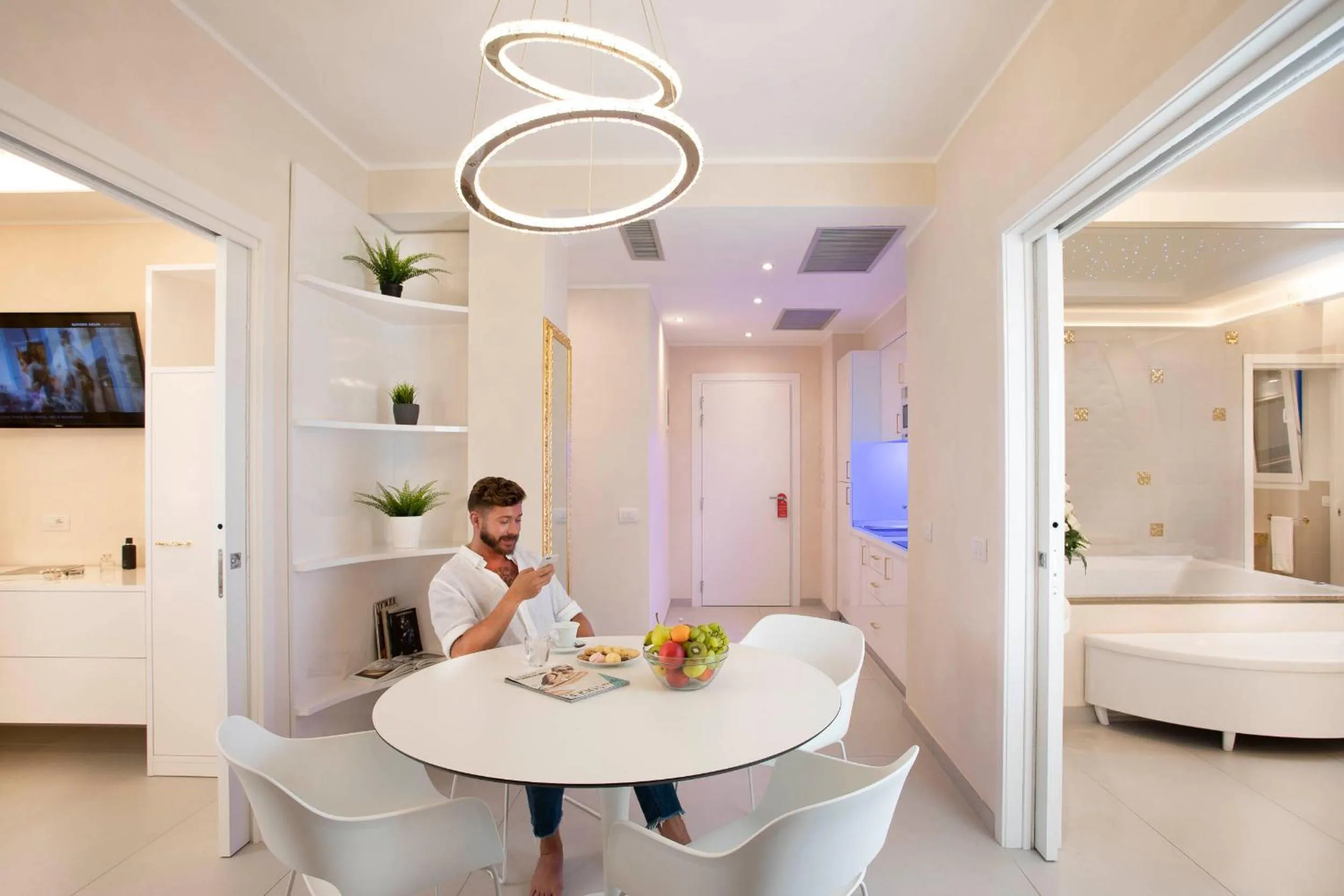 Bed in White Suite & Apartments