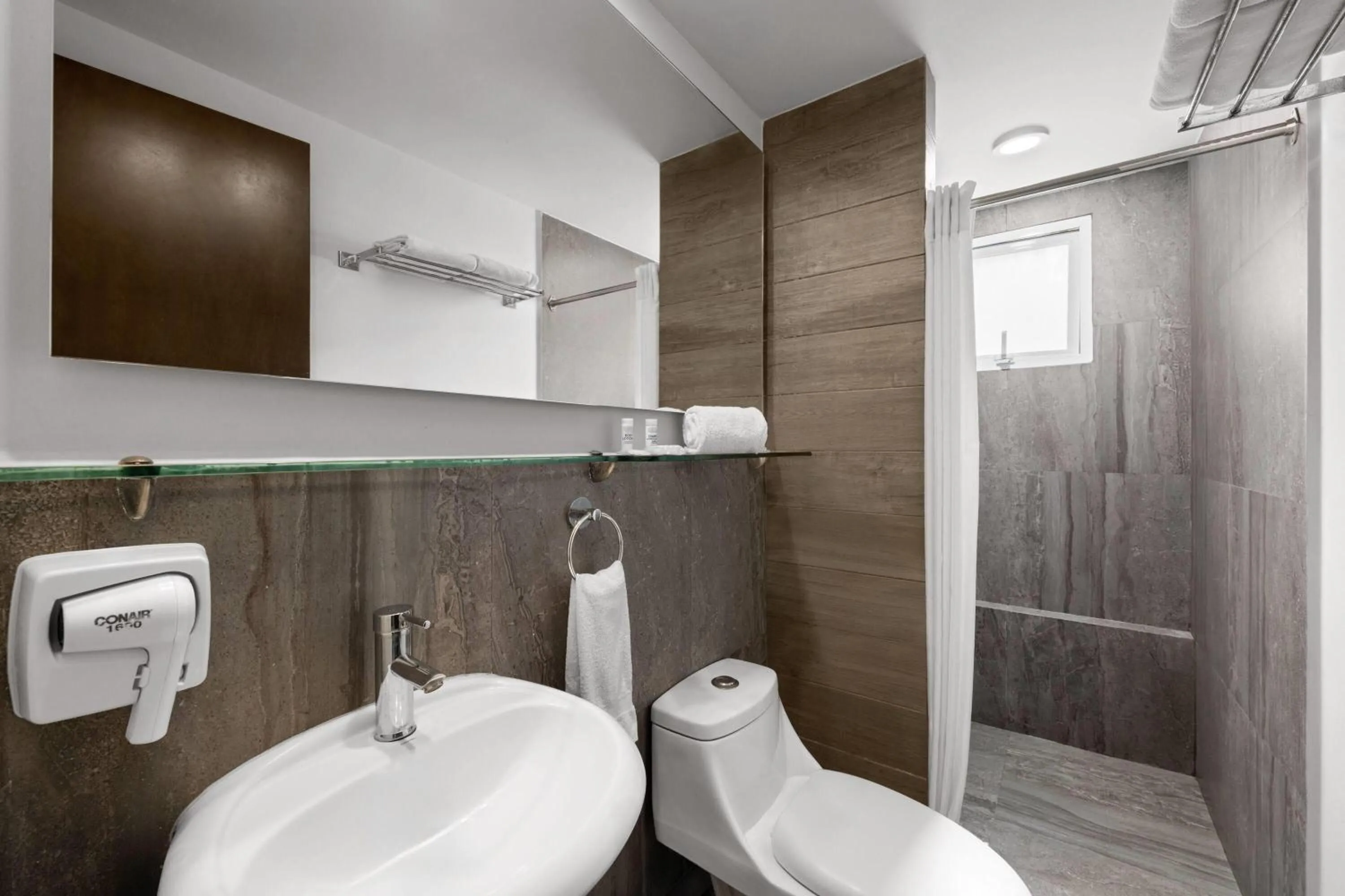 Bathroom in Ramada by Wyndham Tampico Centro