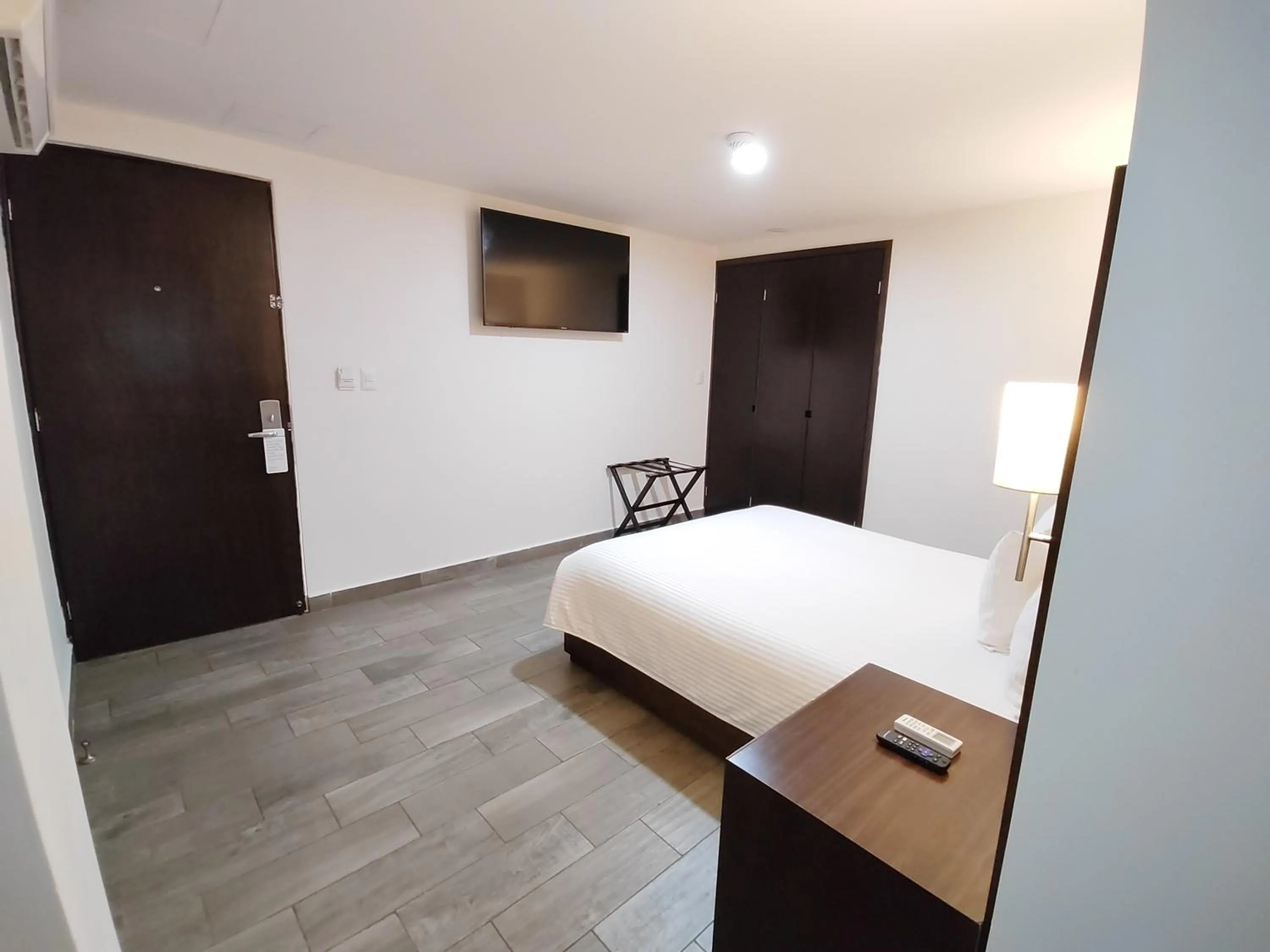 Photo of the whole room, Bed in Ramada by Wyndham Tampico Centro