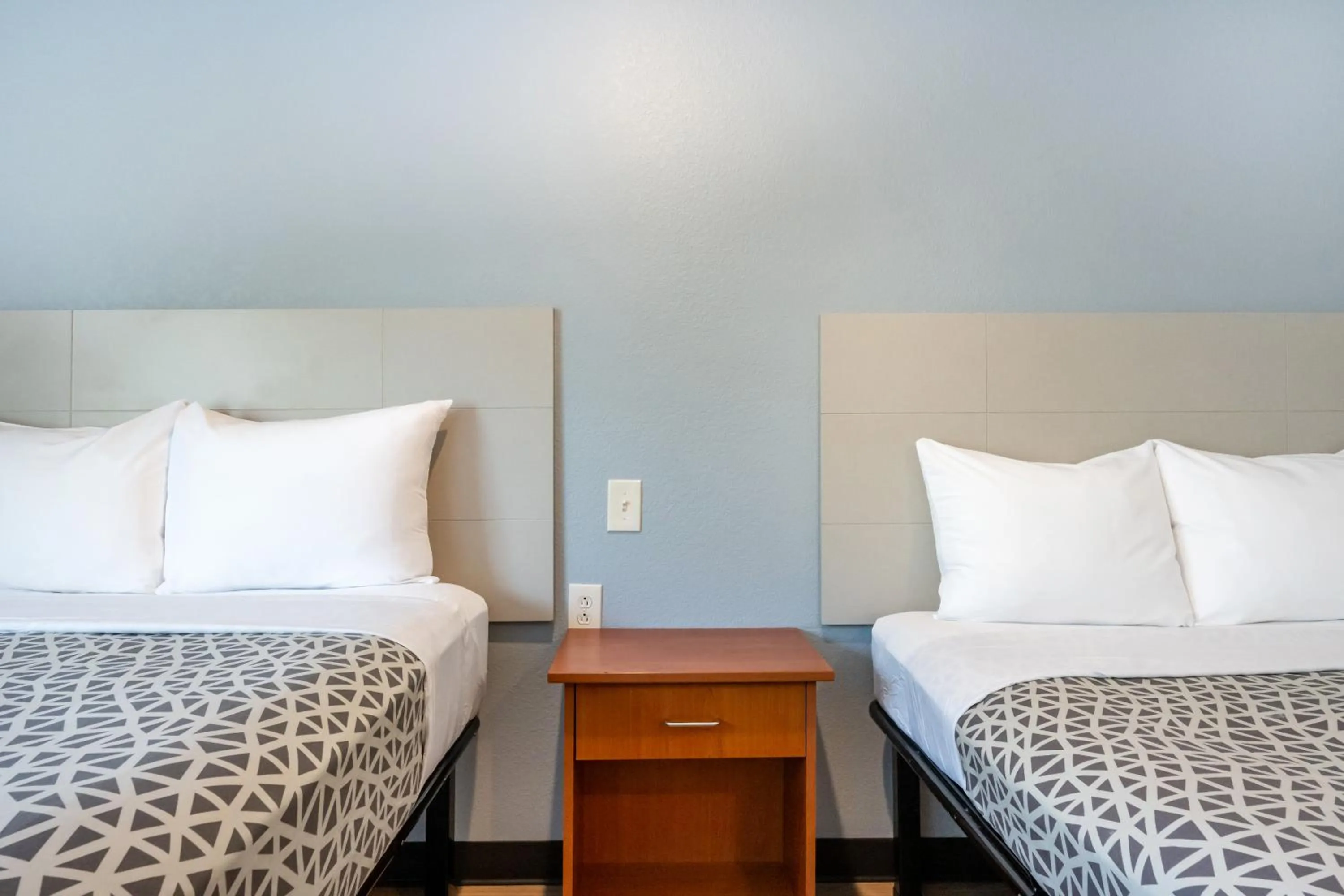 Bed in Suburban Studios Huntsville University Area