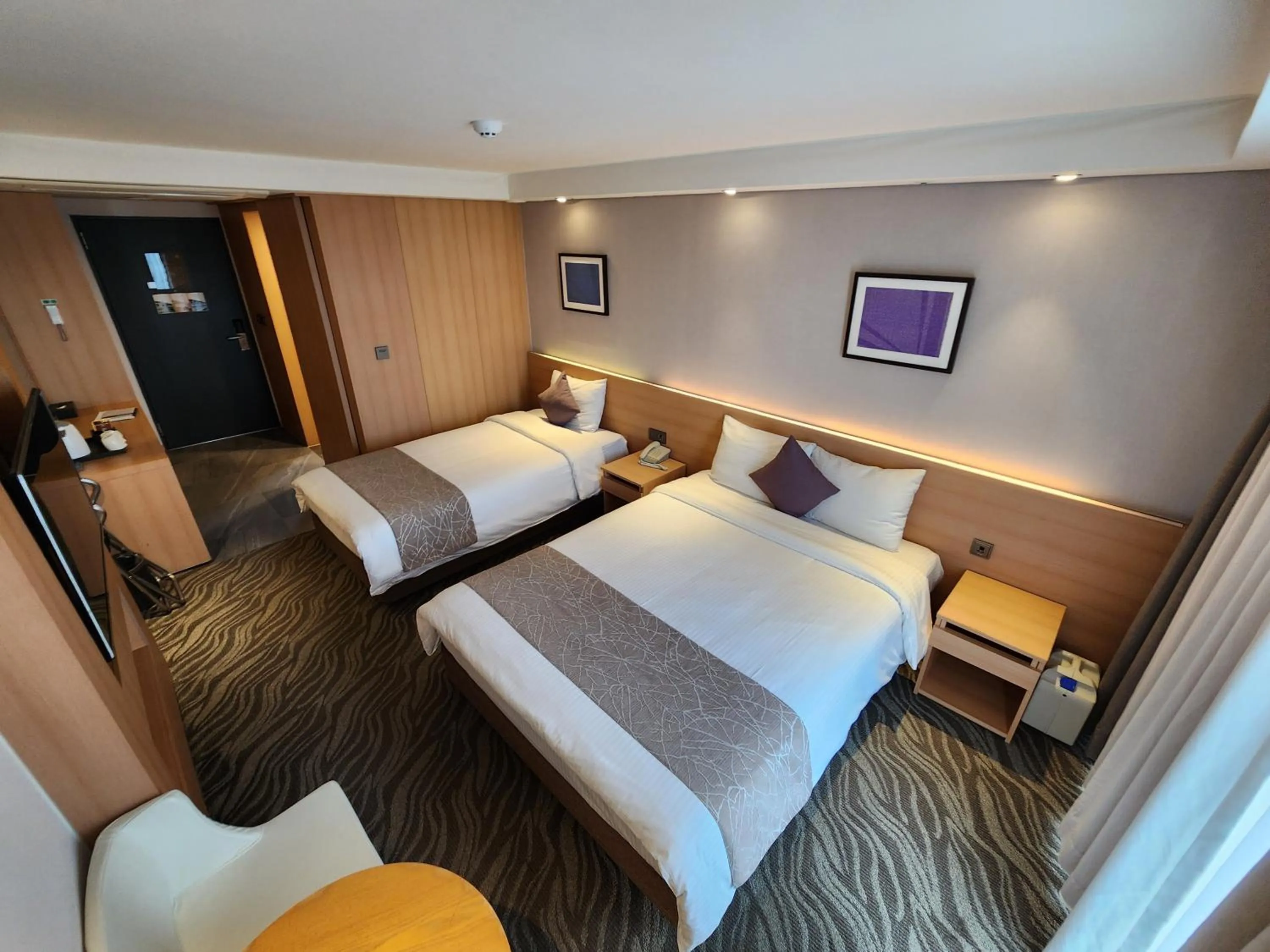 Bed in Seogwipo JS Hotel