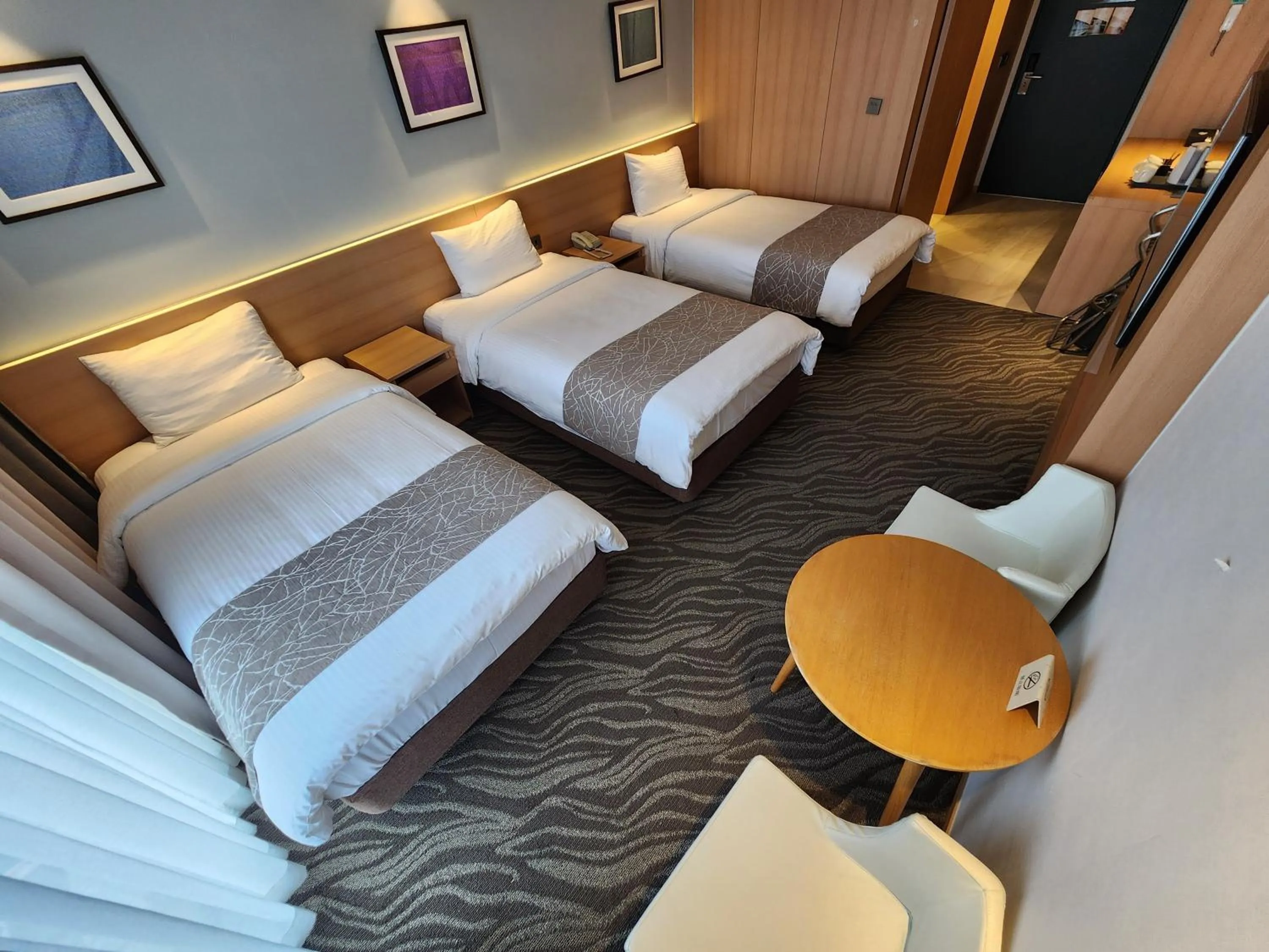 Bed in Seogwipo JS Hotel