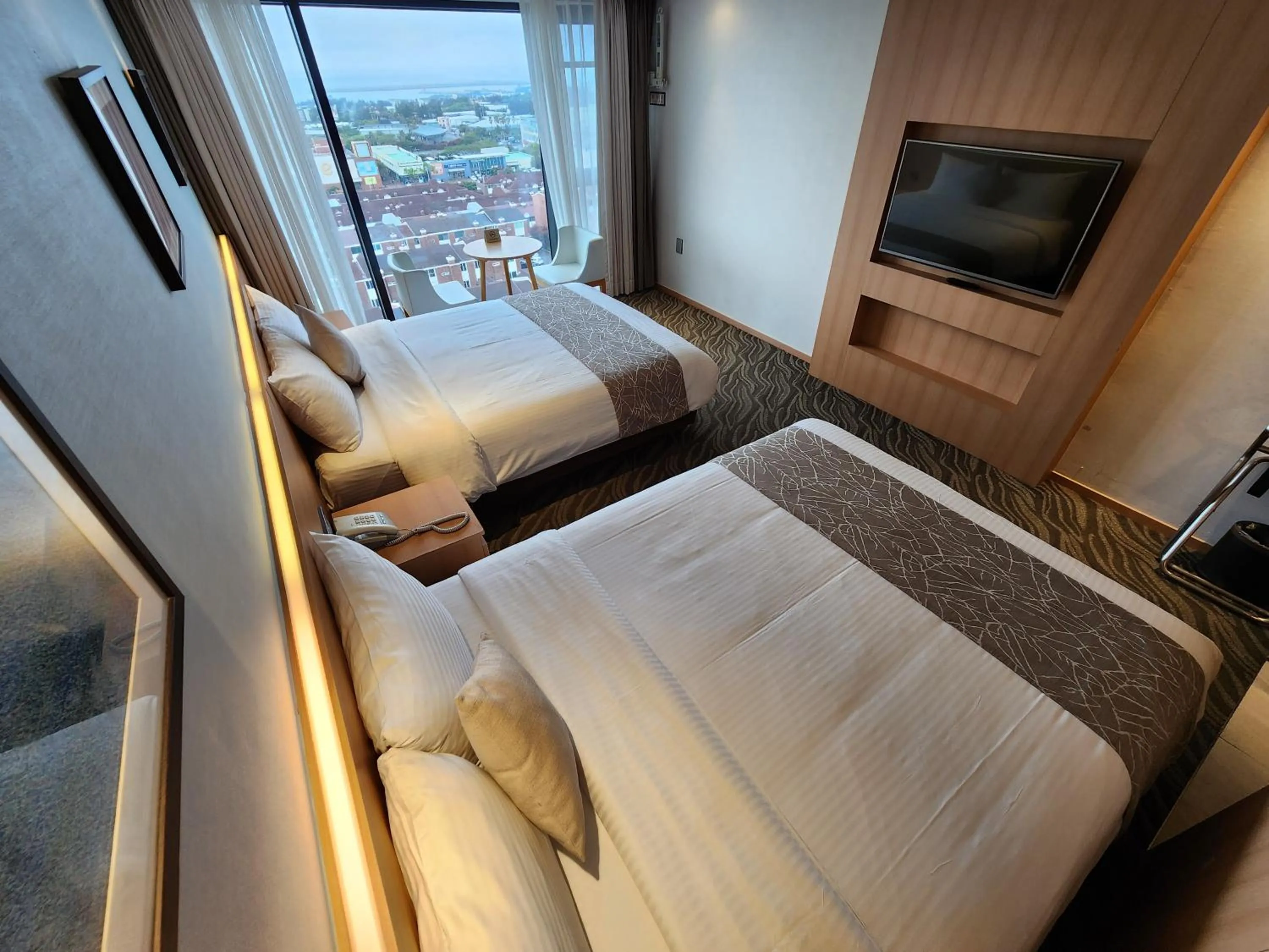 Bed in Seogwipo JS Hotel