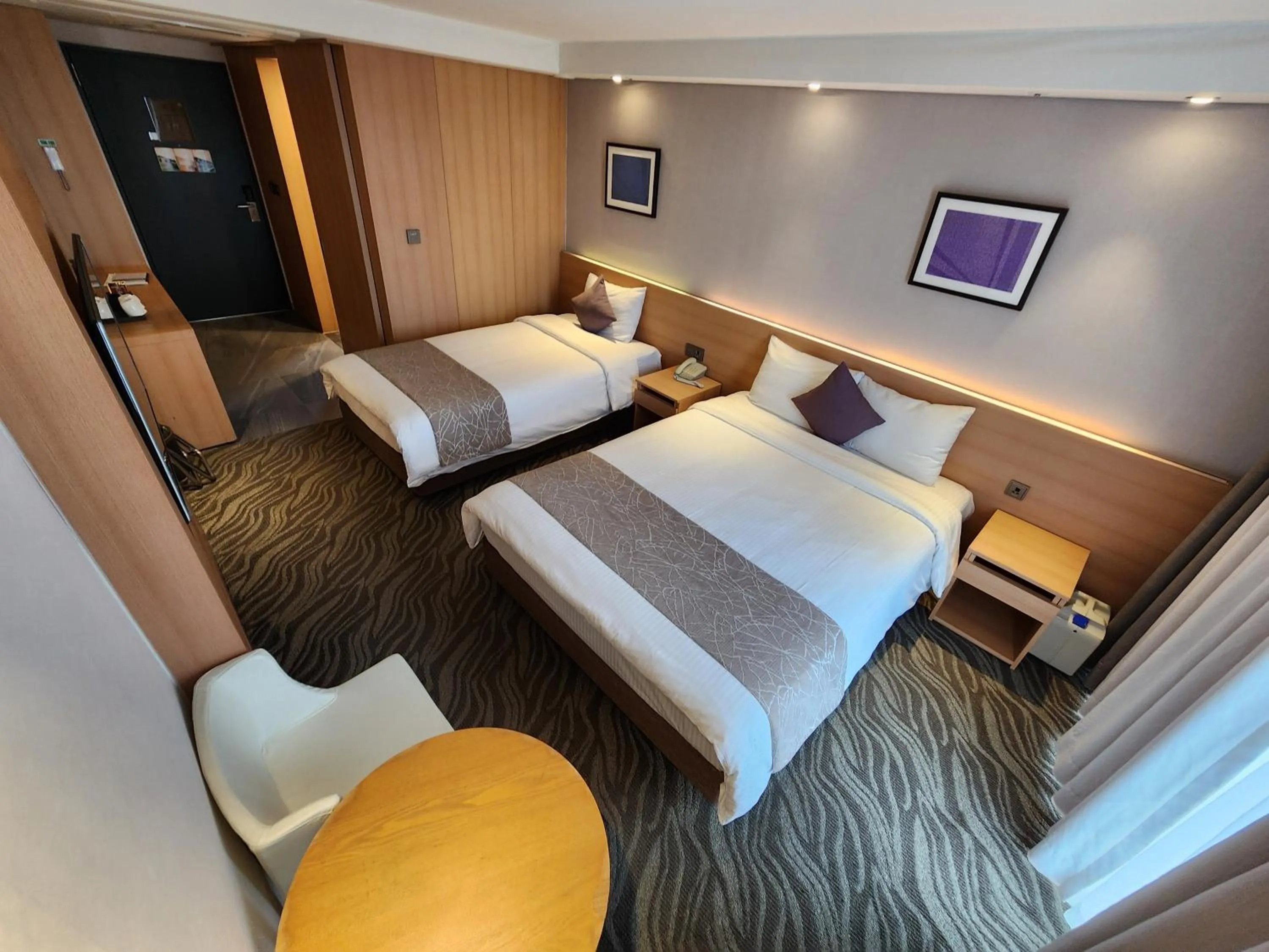 Bed in Seogwipo JS Hotel