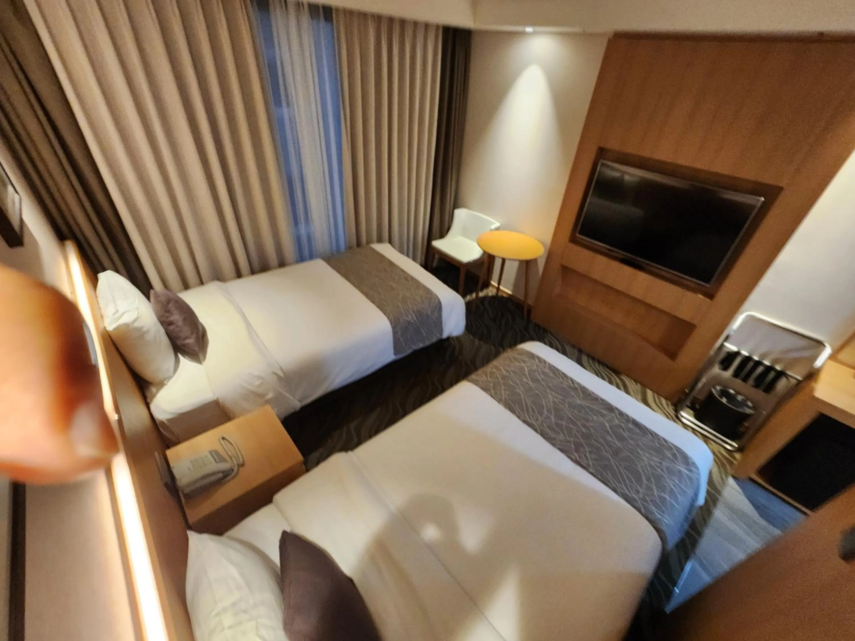 Bed in Seogwipo JS Hotel
