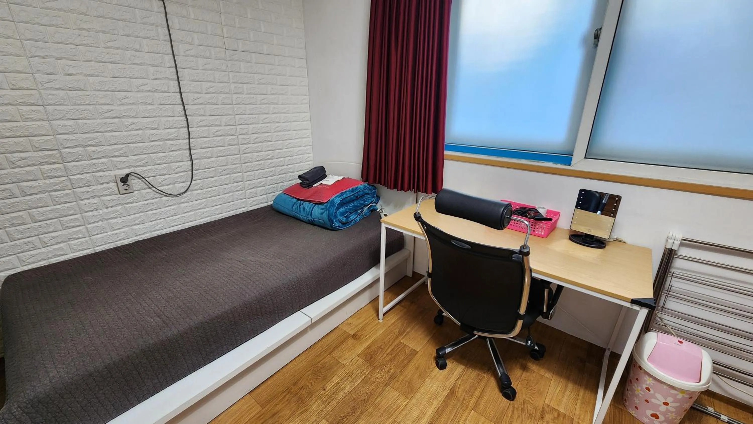 Bed in Daejeon Guesthouse Sky Garden