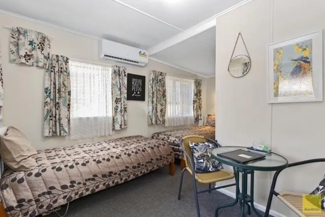 Bed in Waitomo Caves Guest Lodge