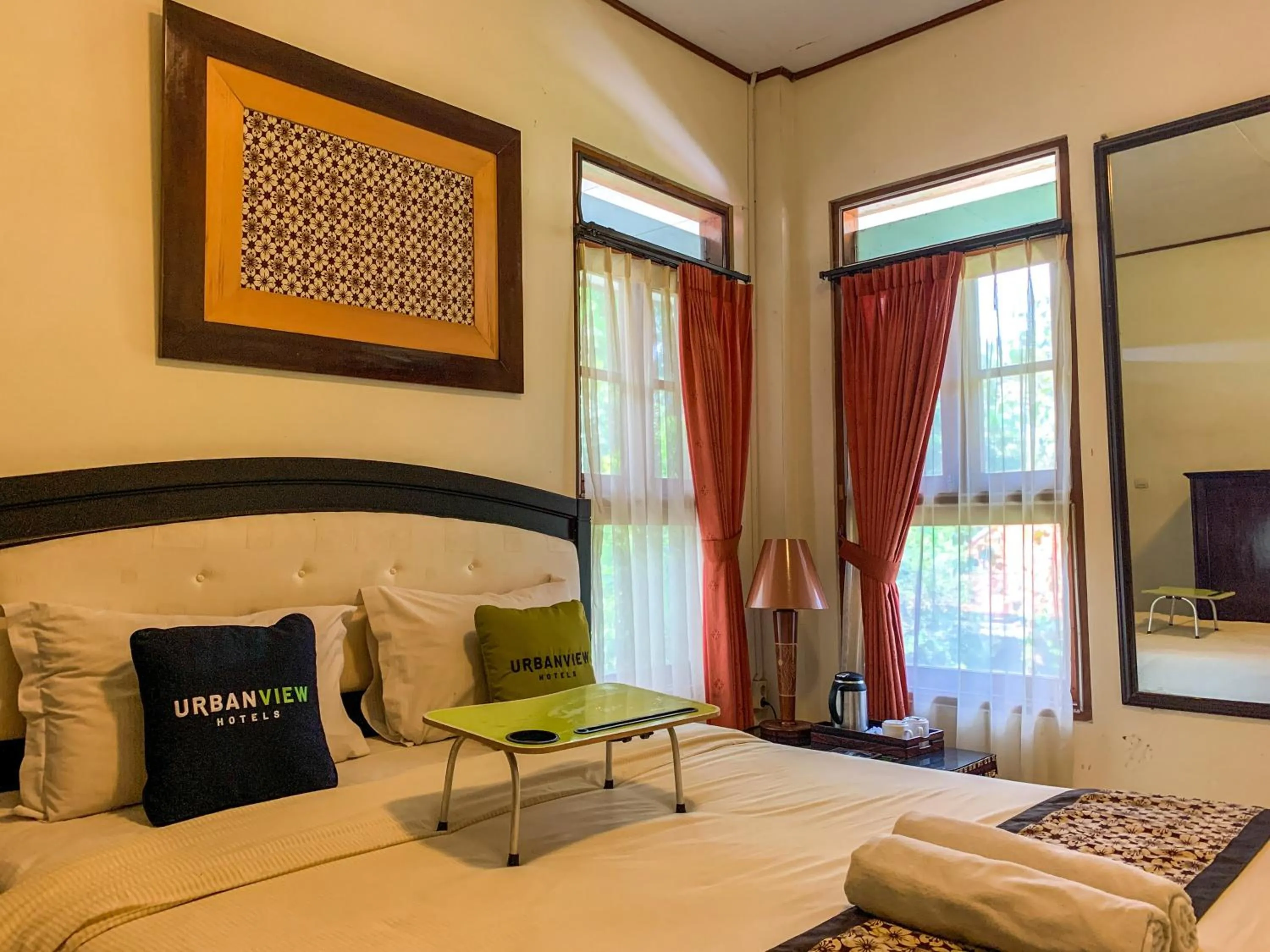 Bed in Urbanview Sasono Putro Condoongcatur by RedDoorz