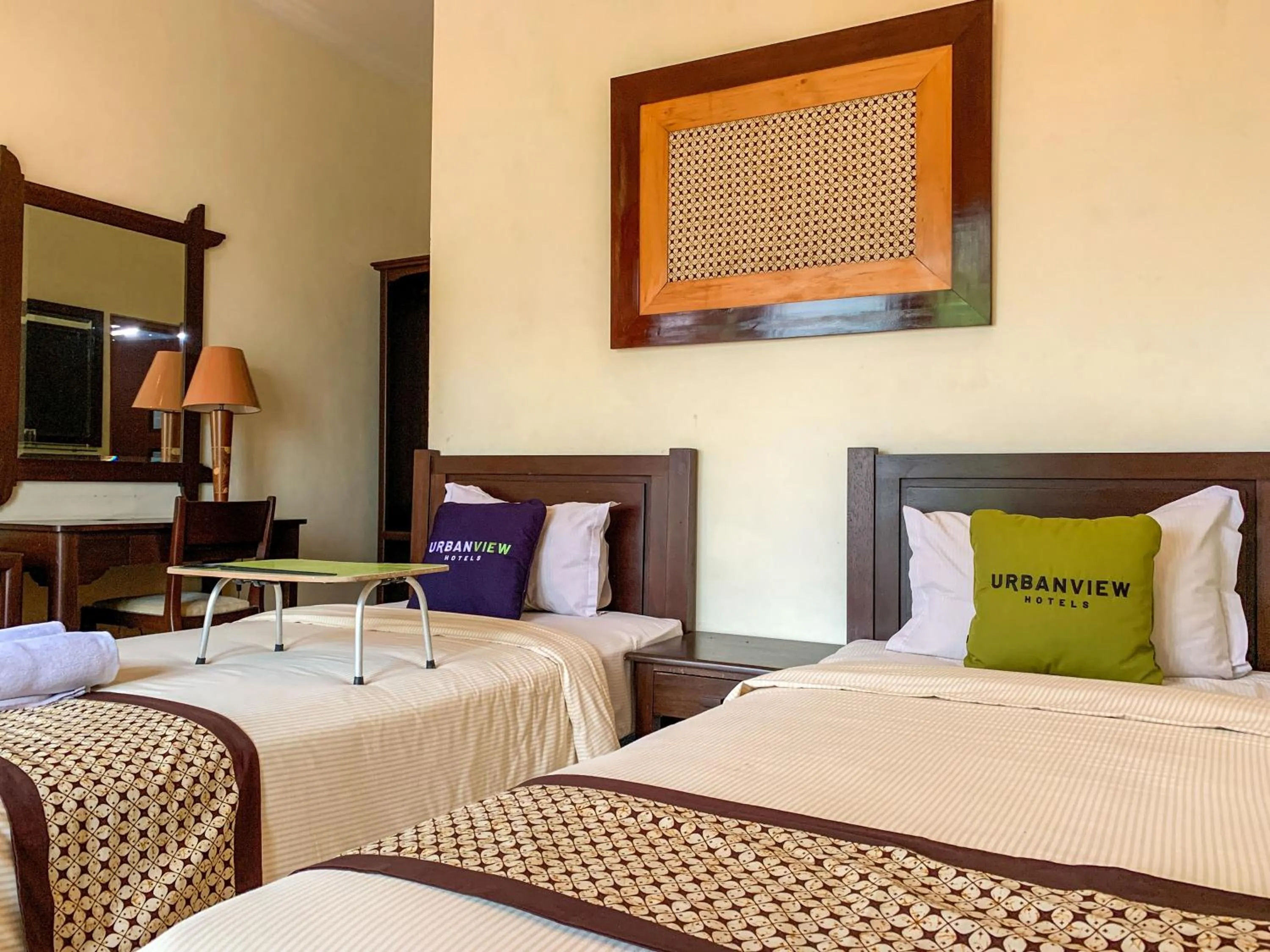 Bed in Urbanview Sasono Putro Condoongcatur by RedDoorz