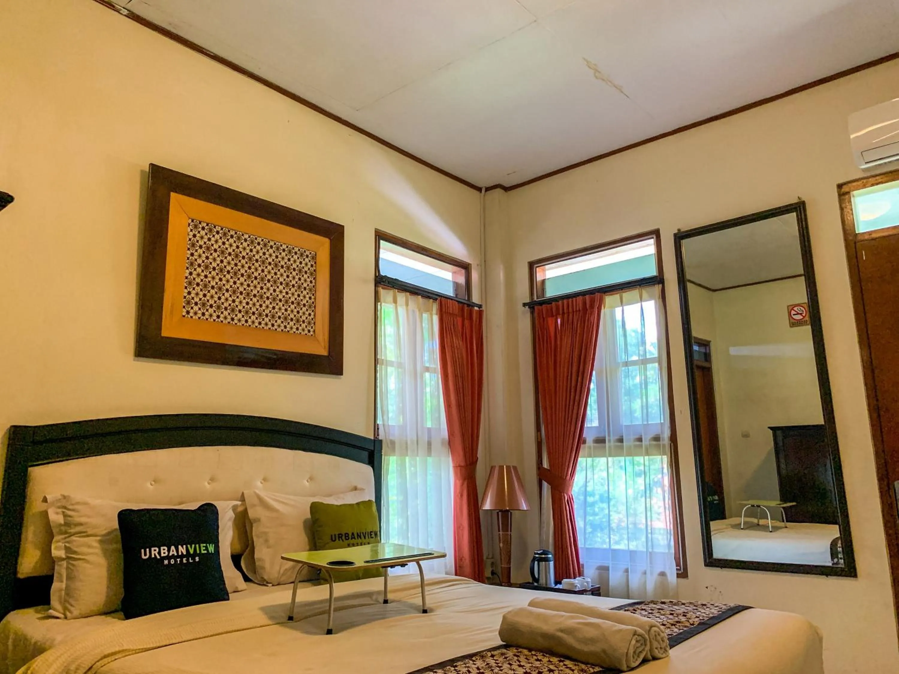 Bed in Urbanview Sasono Putro Condoongcatur by RedDoorz