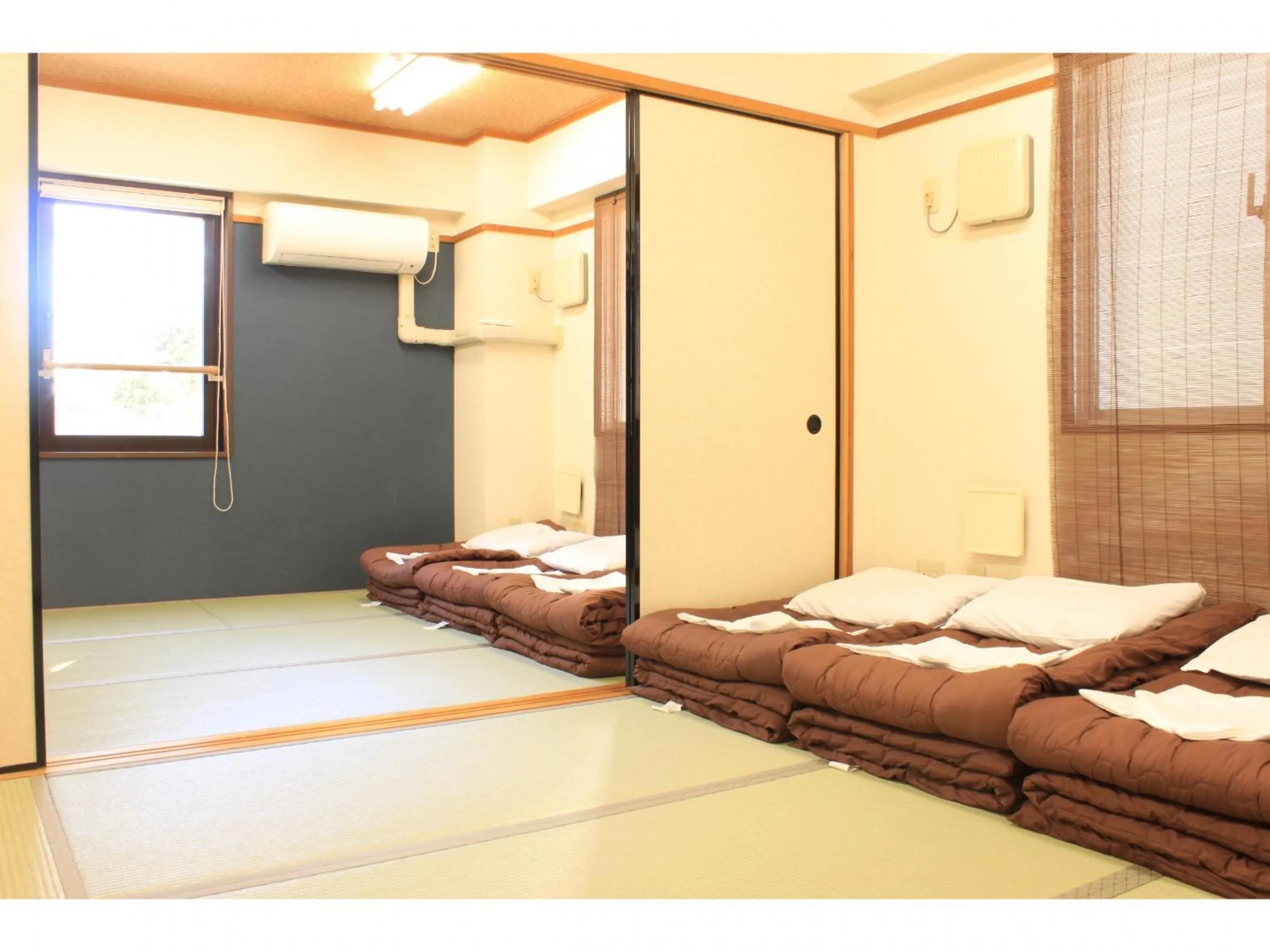 Photo of the whole room, Bed in T and K Hostel Kobe Sannomiya East