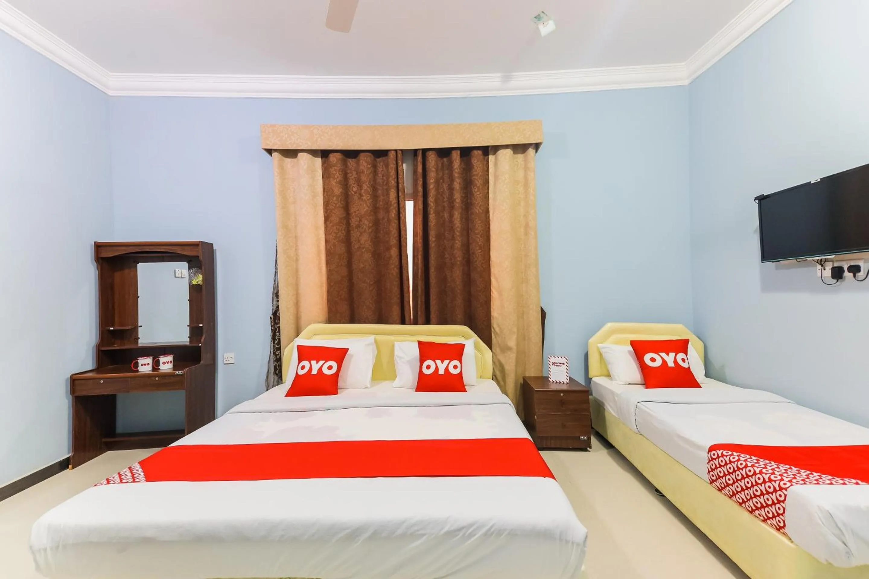 Bedroom in Super OYO 110 Ras Al Hadd Guest House