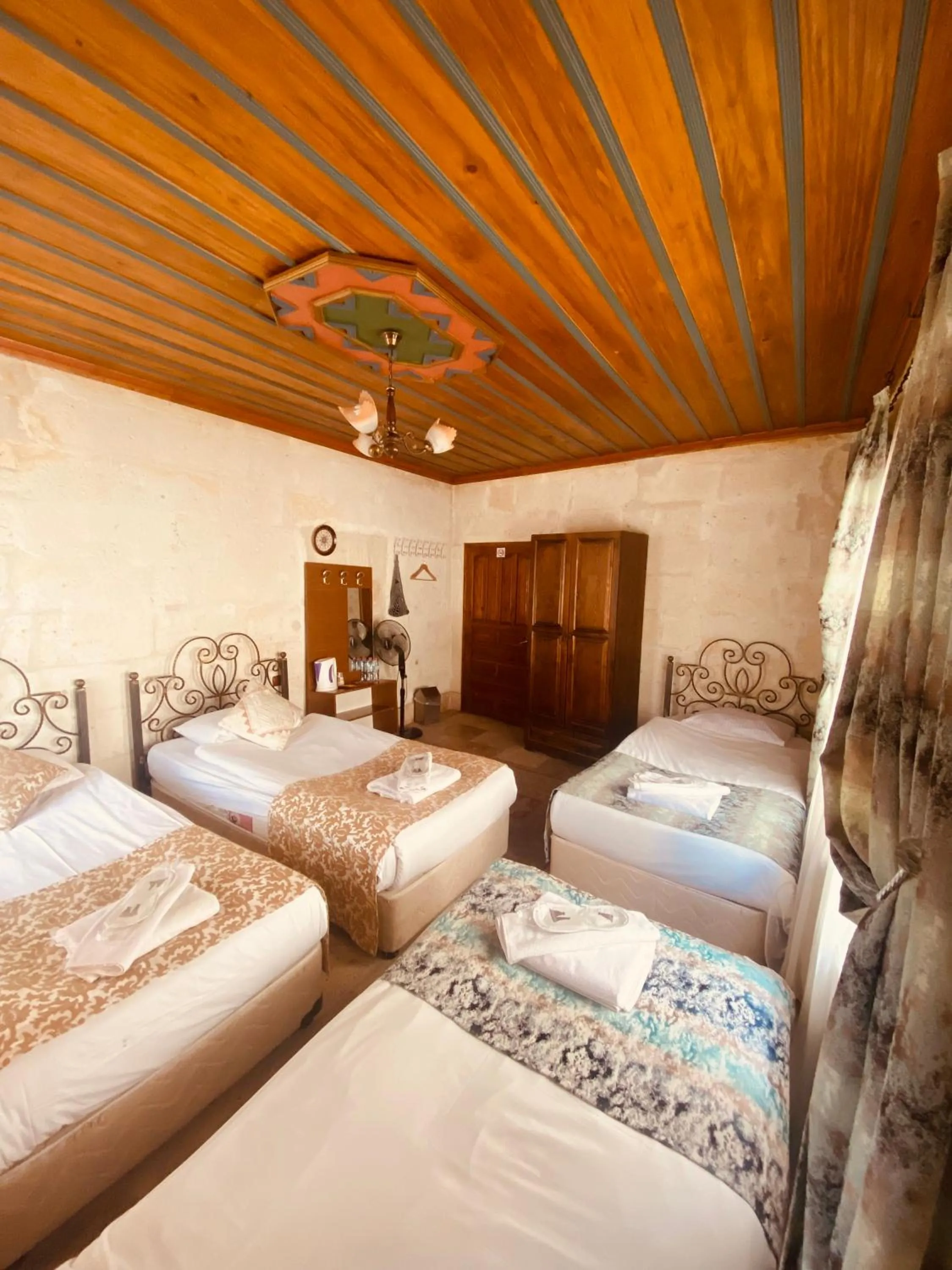 Bedroom, Bed in Center Cave House