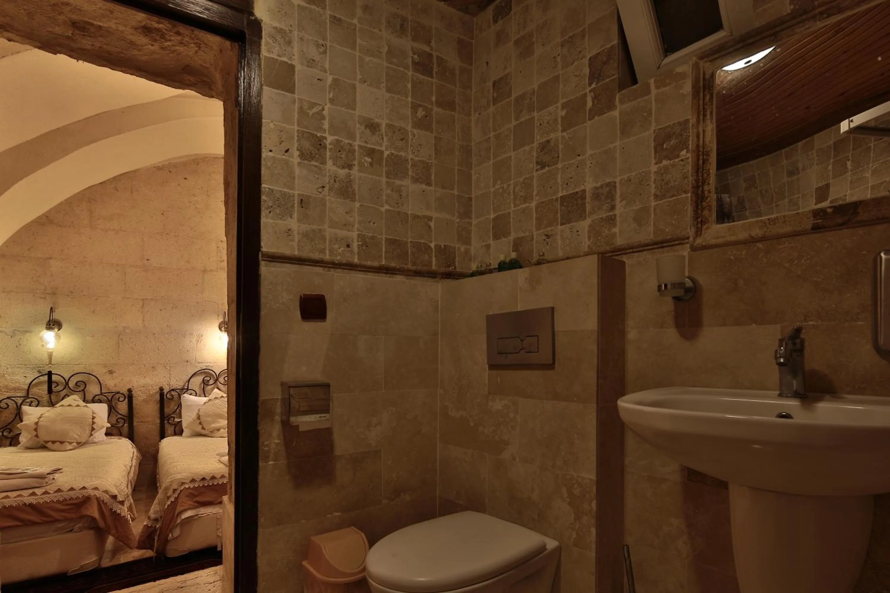 Bathroom, Bed in Center Cave House