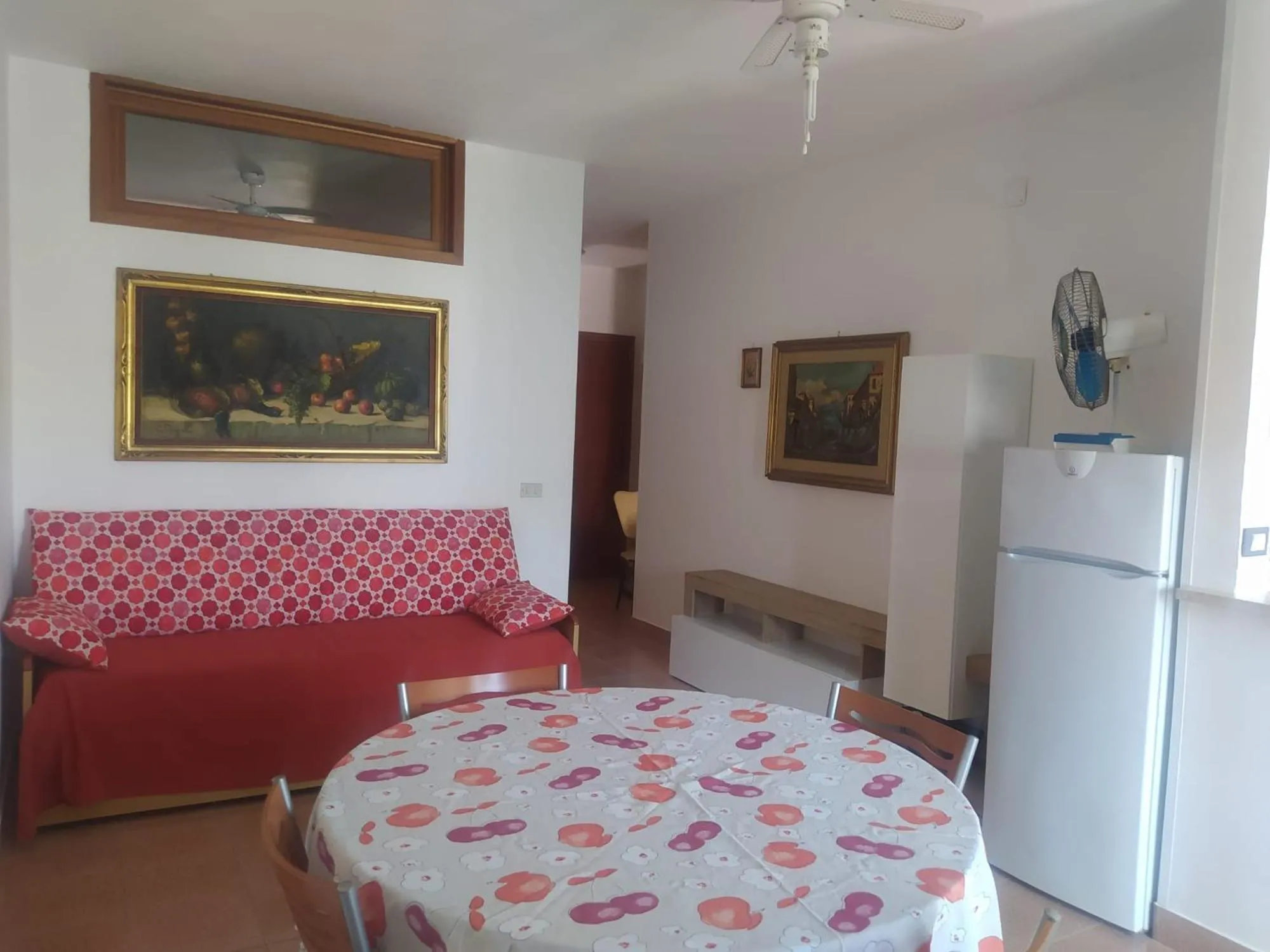 Seating area, Bed in Appartamenti Le Fontanelle
