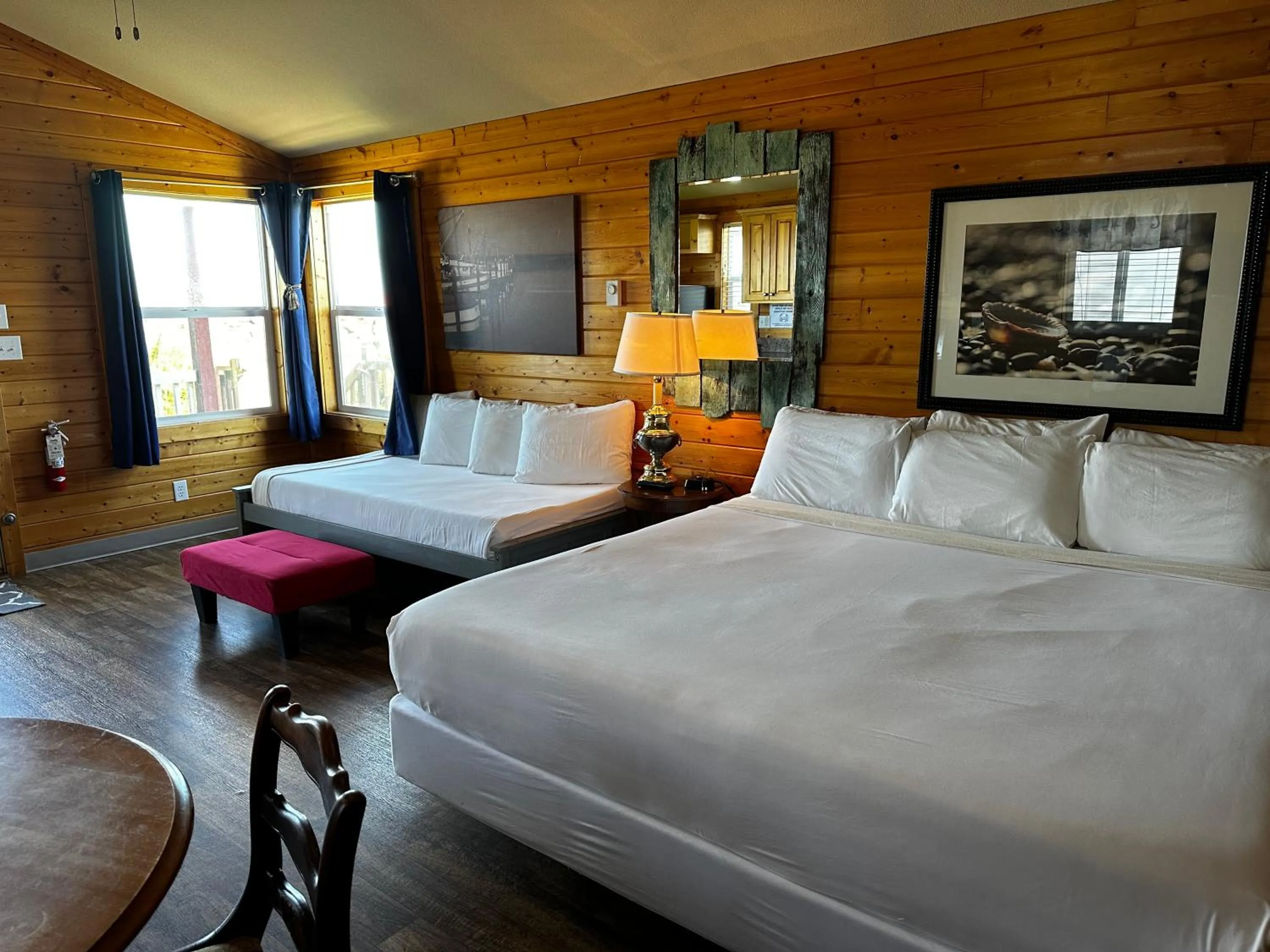 Living room, Bed in Westport Marina Cottages