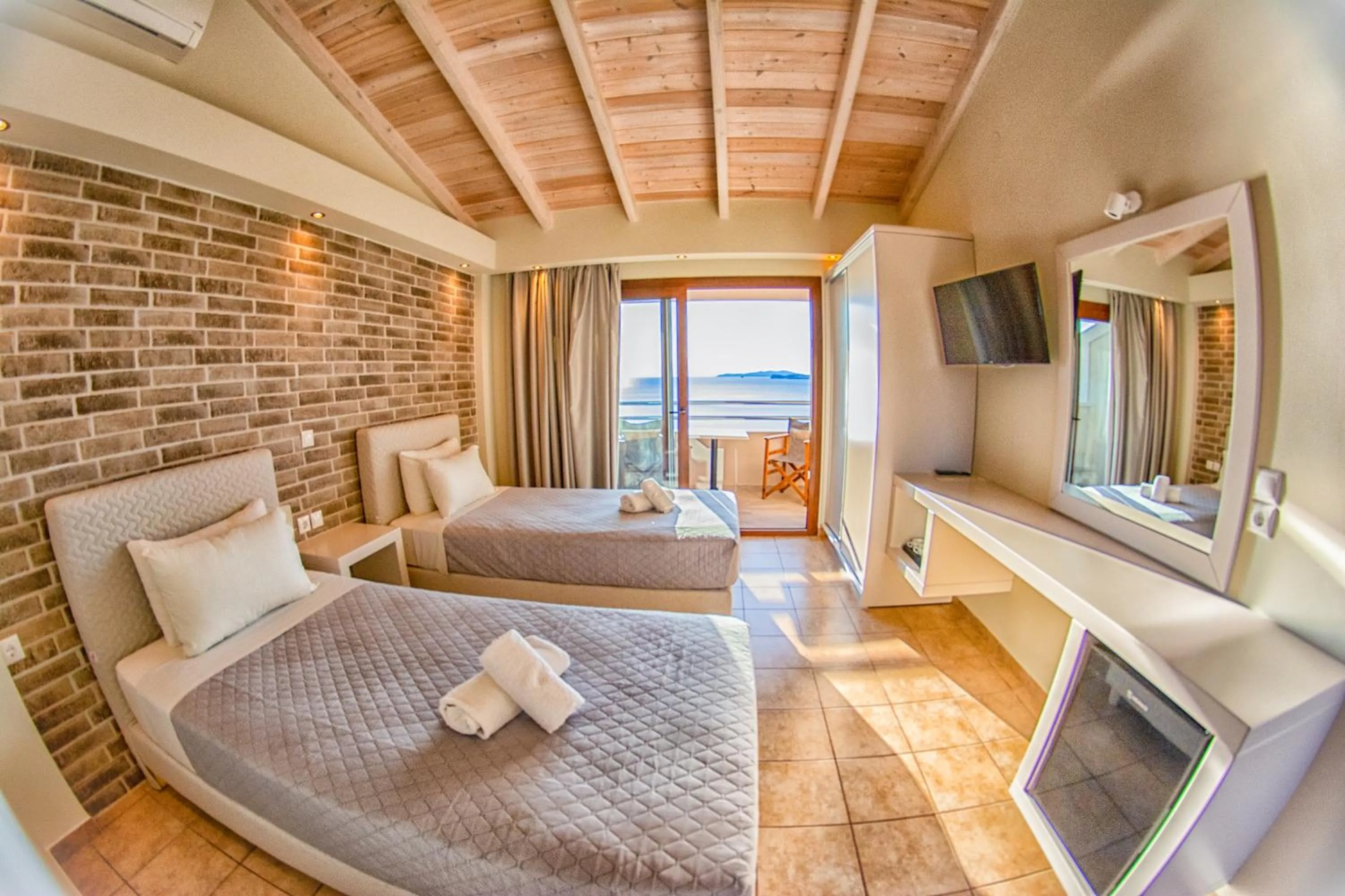 Bed in Tereza's Sunset Hotel