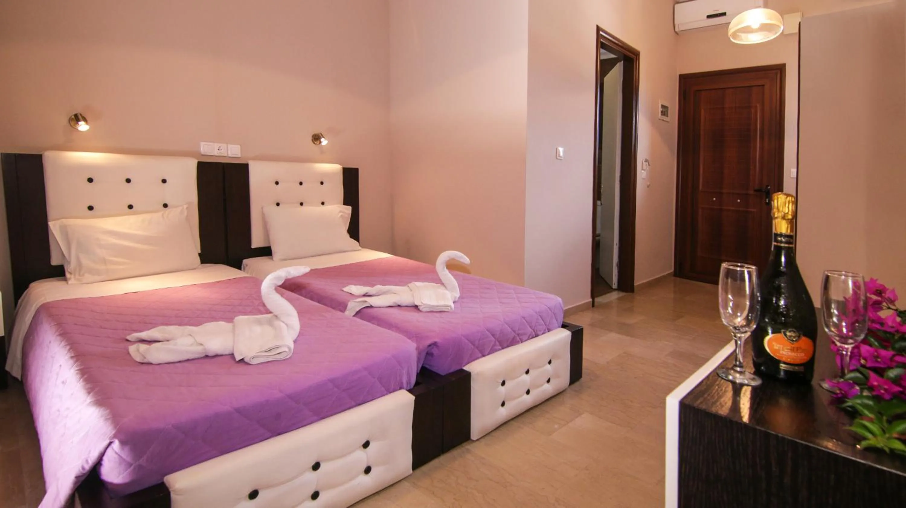 Bed in Tereza's Sunset Hotel