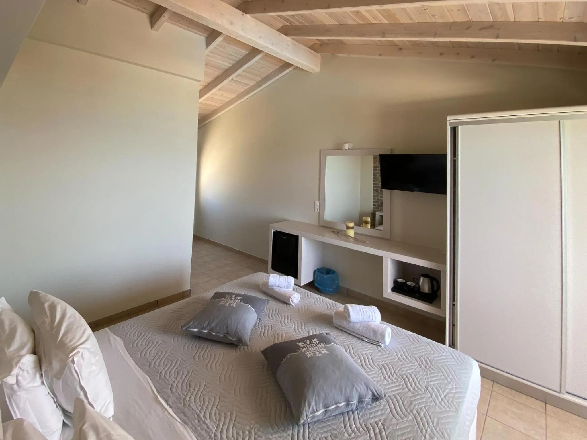 Bed in Tereza's Sunset Hotel