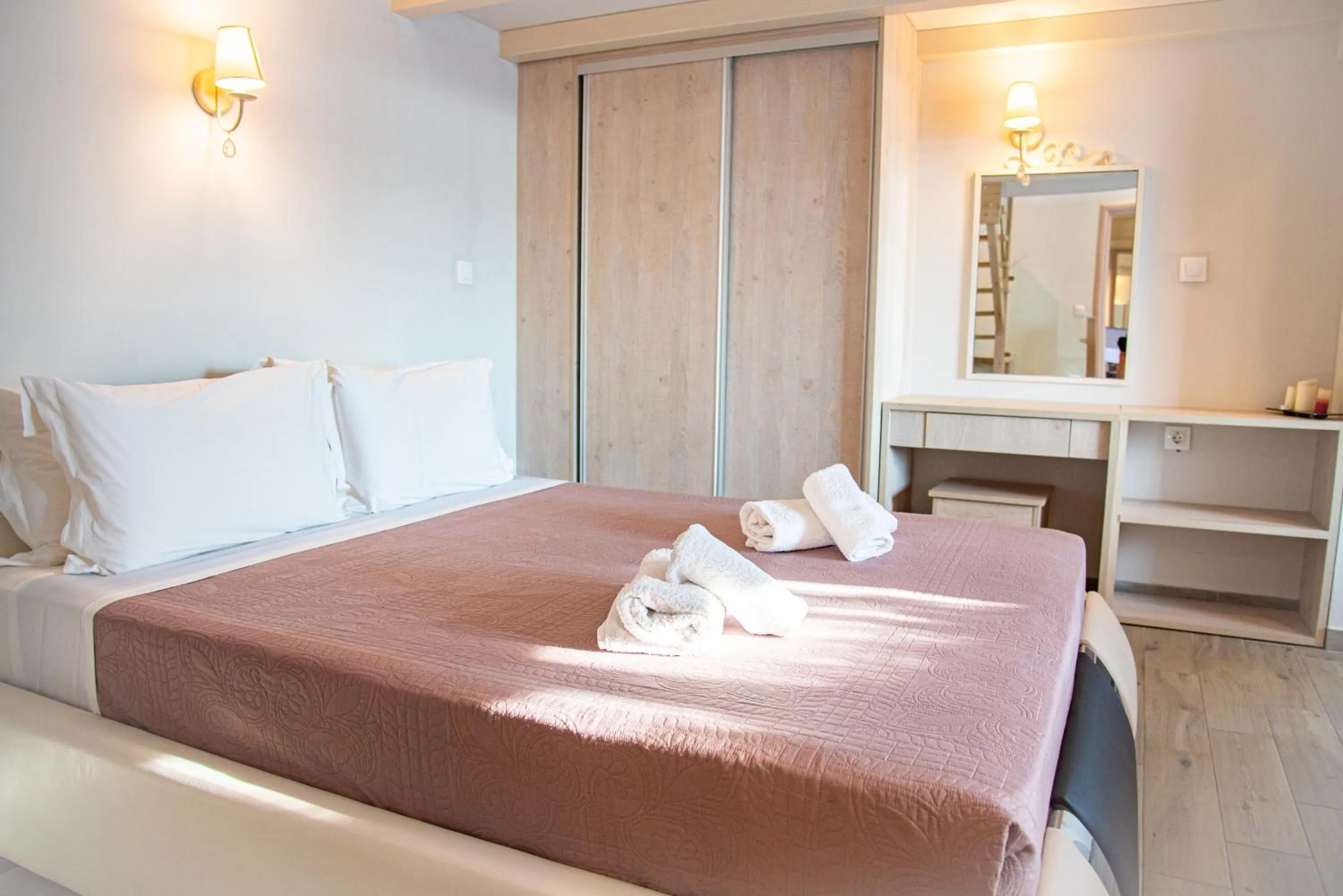 Bed in Tereza's Sunset Hotel