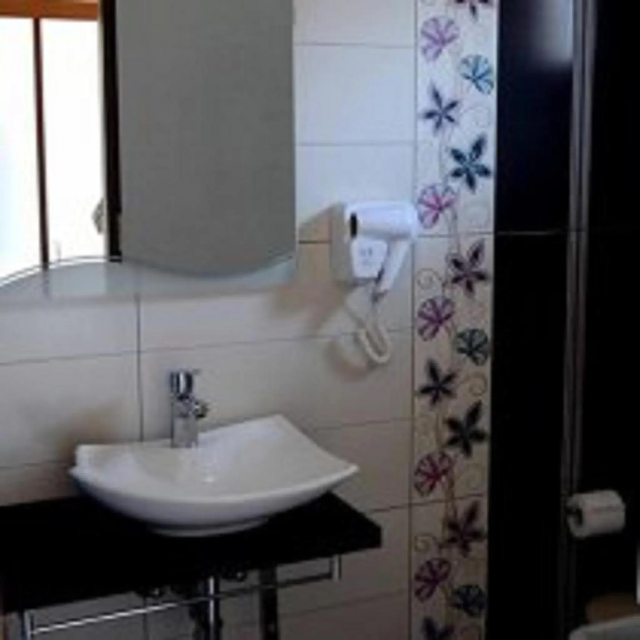 Bathroom in Tereza's Sunset Hotel