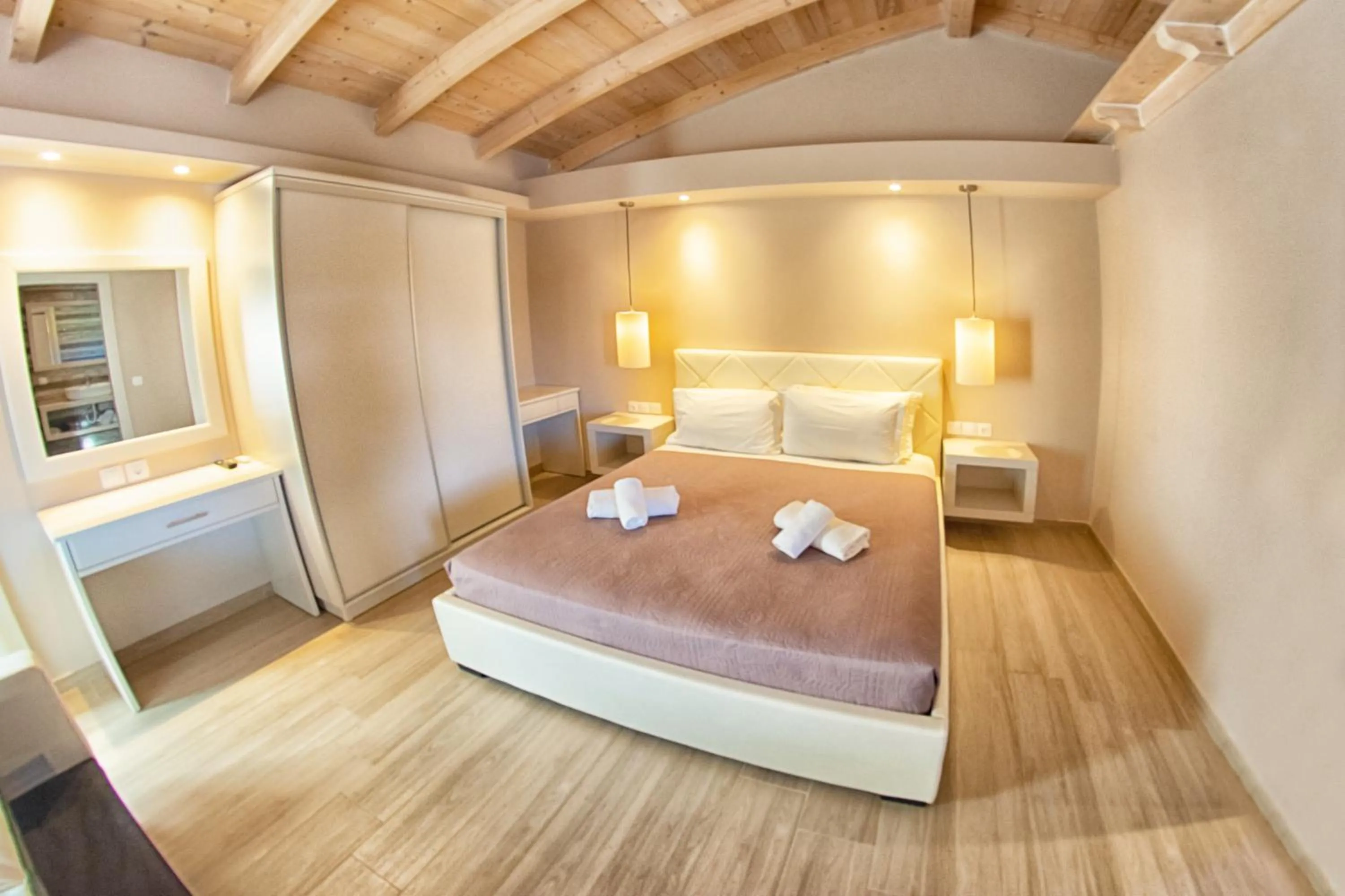Bed in Tereza's Sunset Hotel