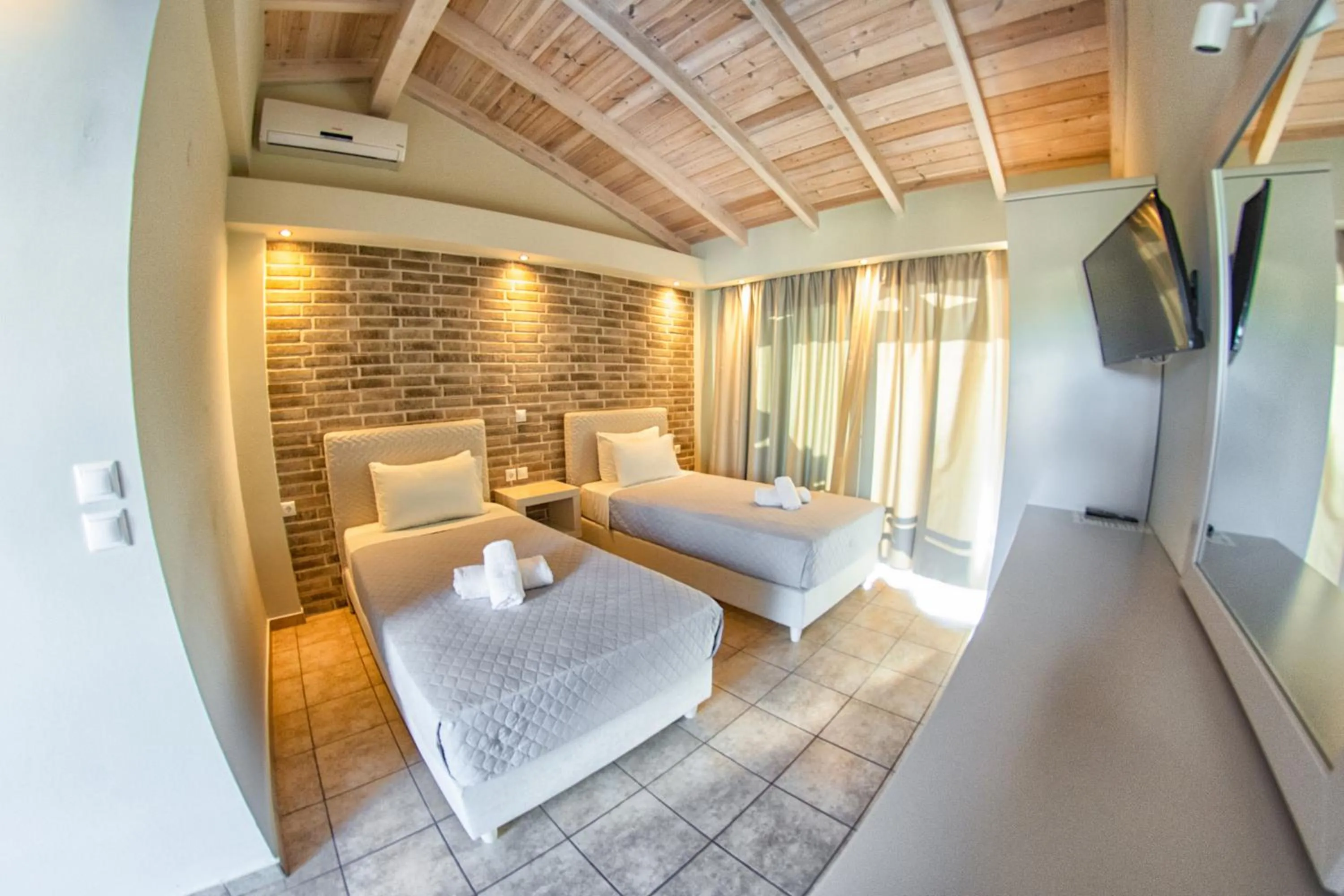 Bed in Tereza's Sunset Hotel