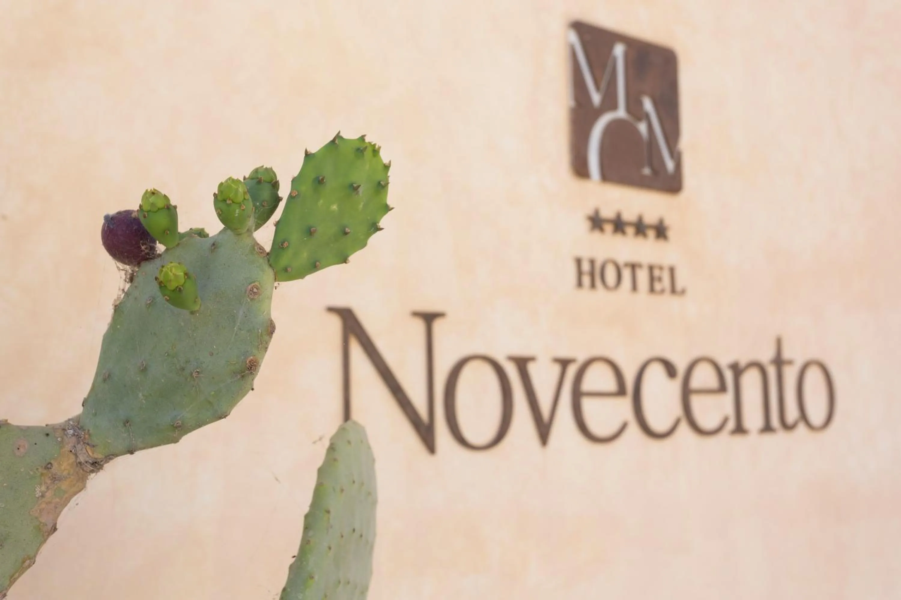 Property logo or sign in Hotel Novecento