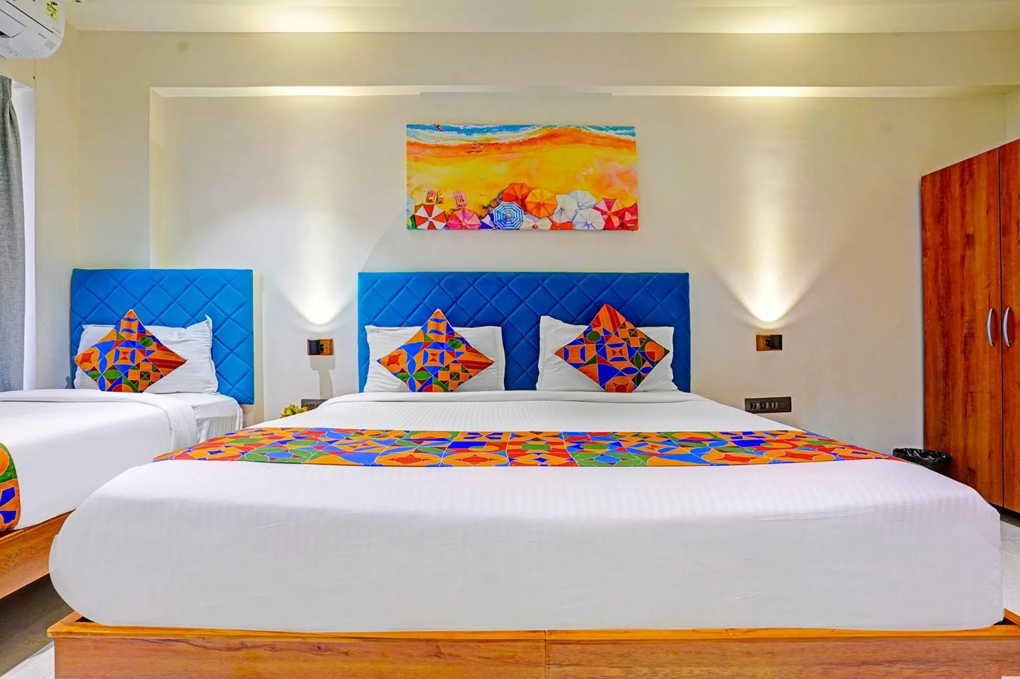 Bed in FabHotel Siddharth Inn - Nr Siddharth Bunglows