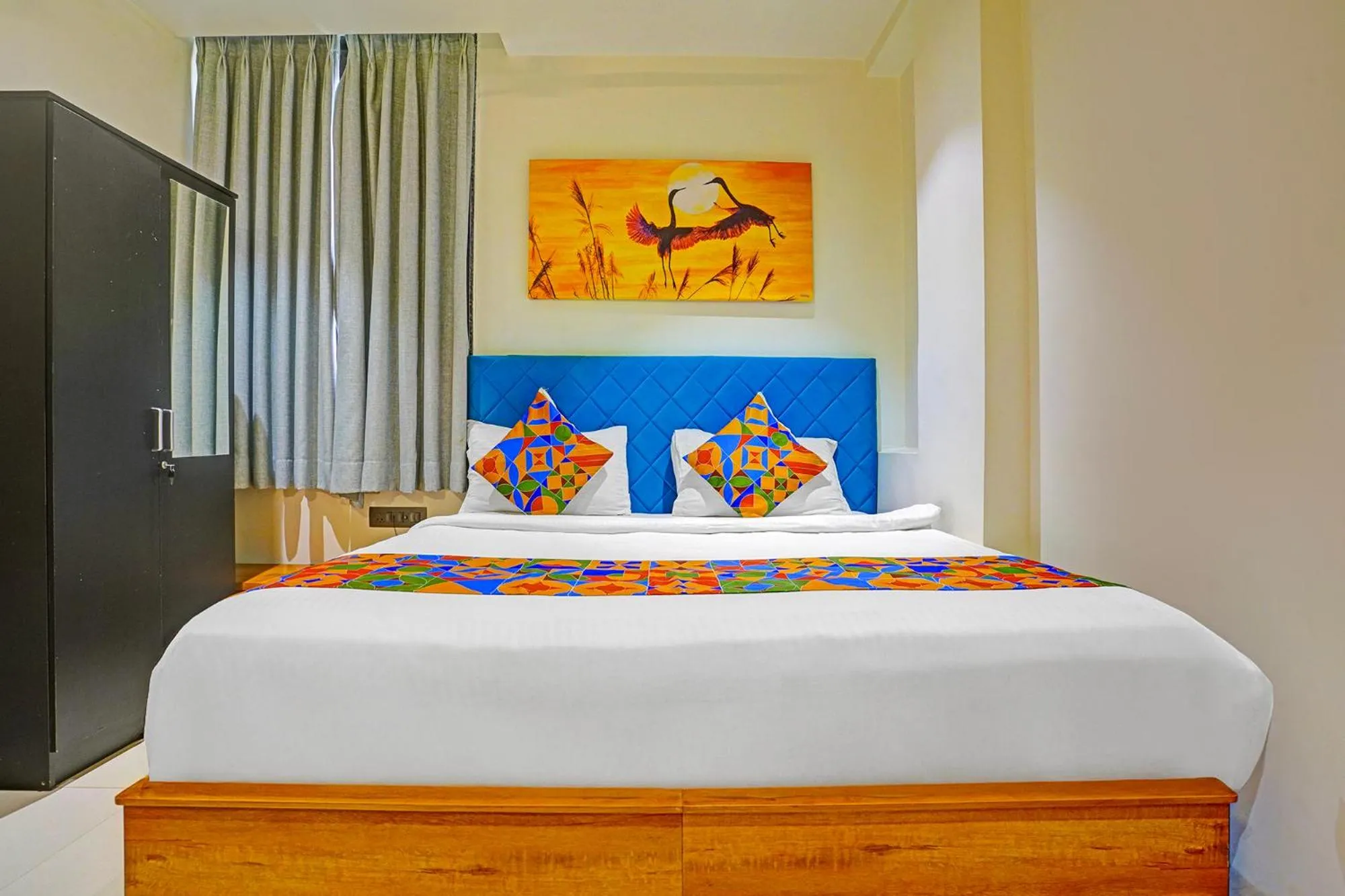 Bed in FabHotel Siddharth Inn - Nr Siddharth Bunglows