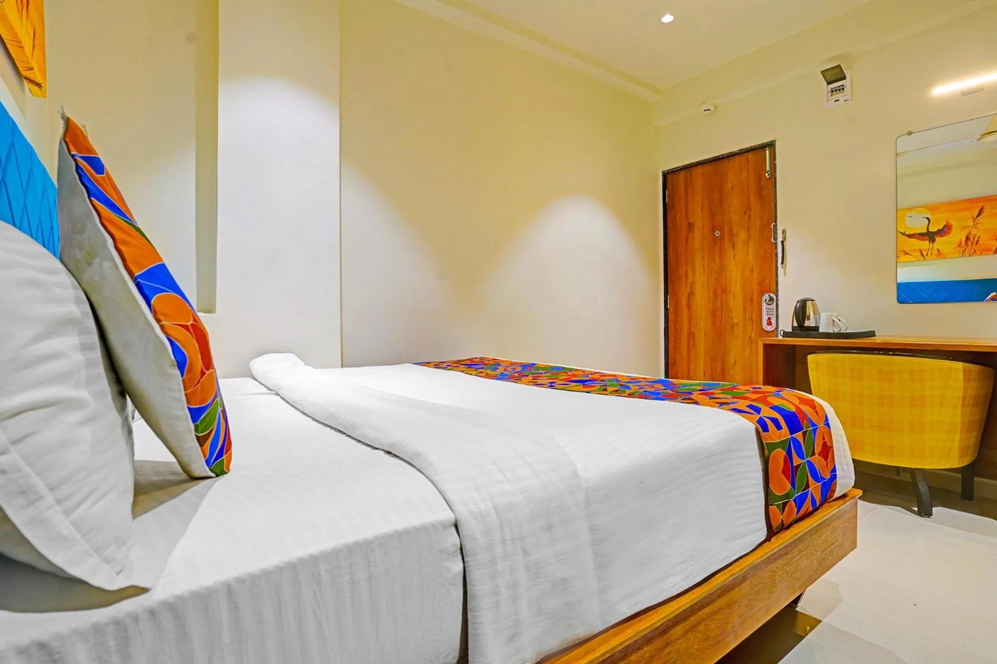 Bed in FabHotel Siddharth Inn - Nr Siddharth Bunglows