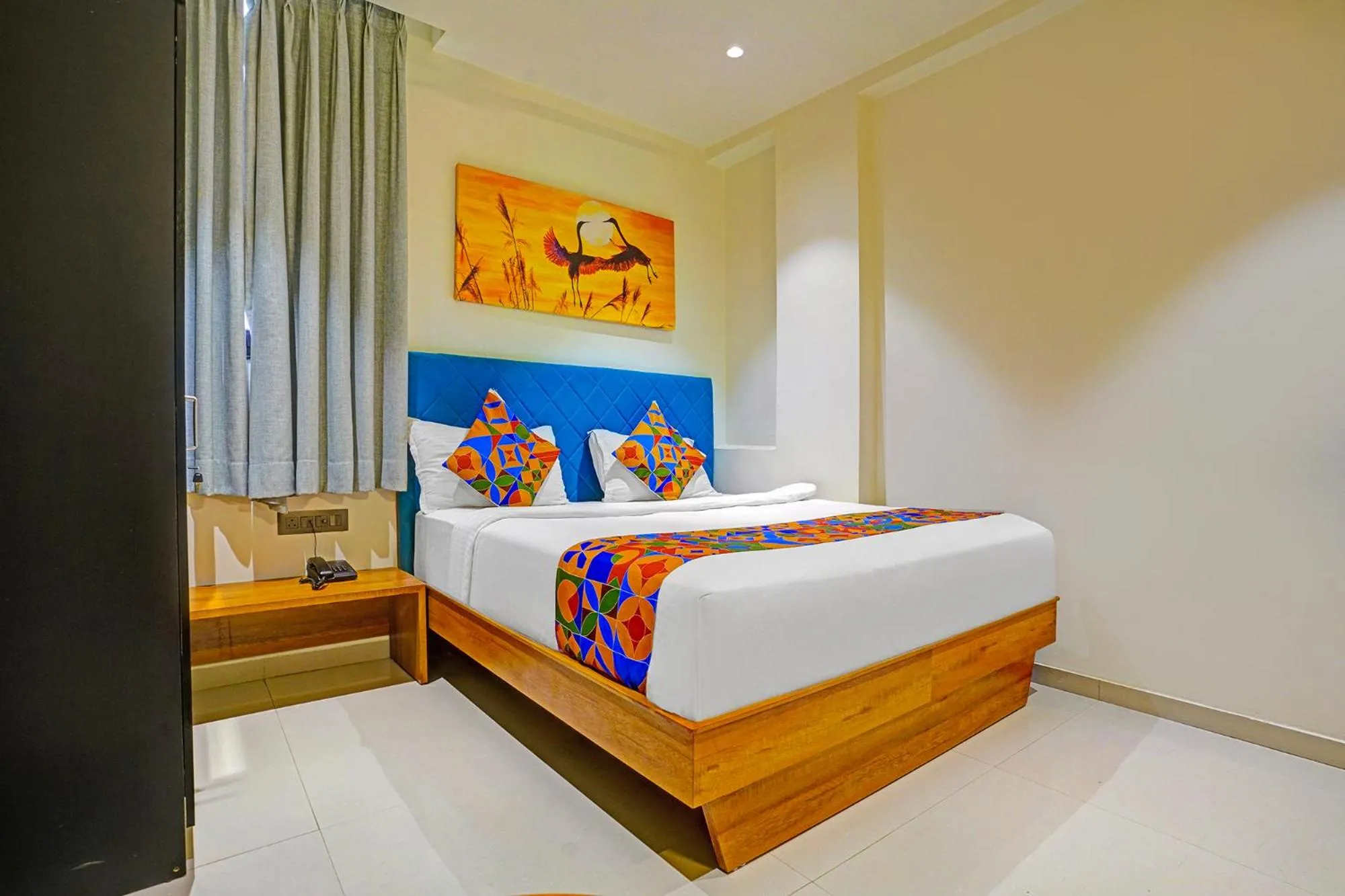 Bed in FabHotel Siddharth Inn - Nr Siddharth Bunglows