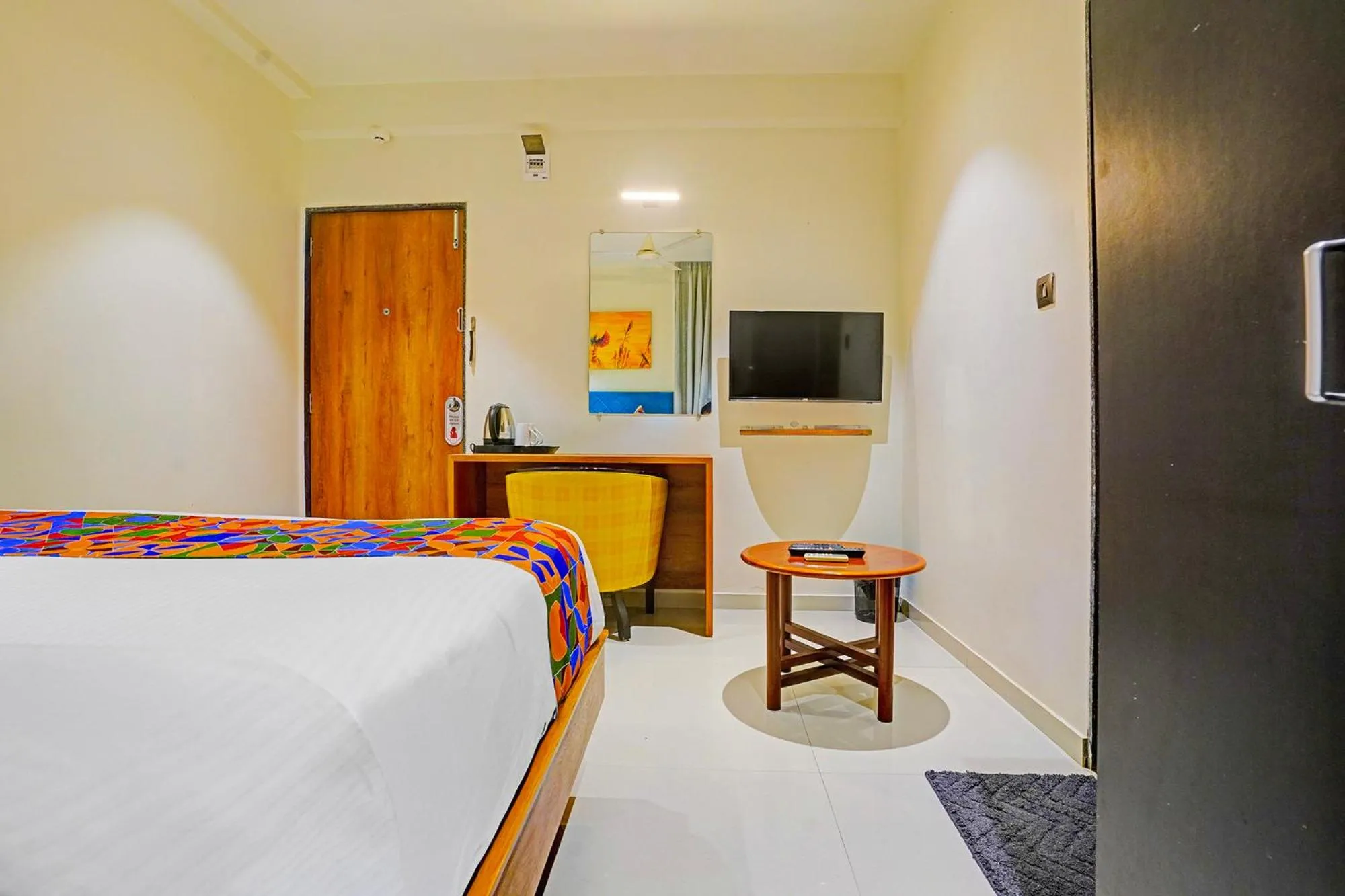 Bed in FabHotel Siddharth Inn - Nr Siddharth Bunglows