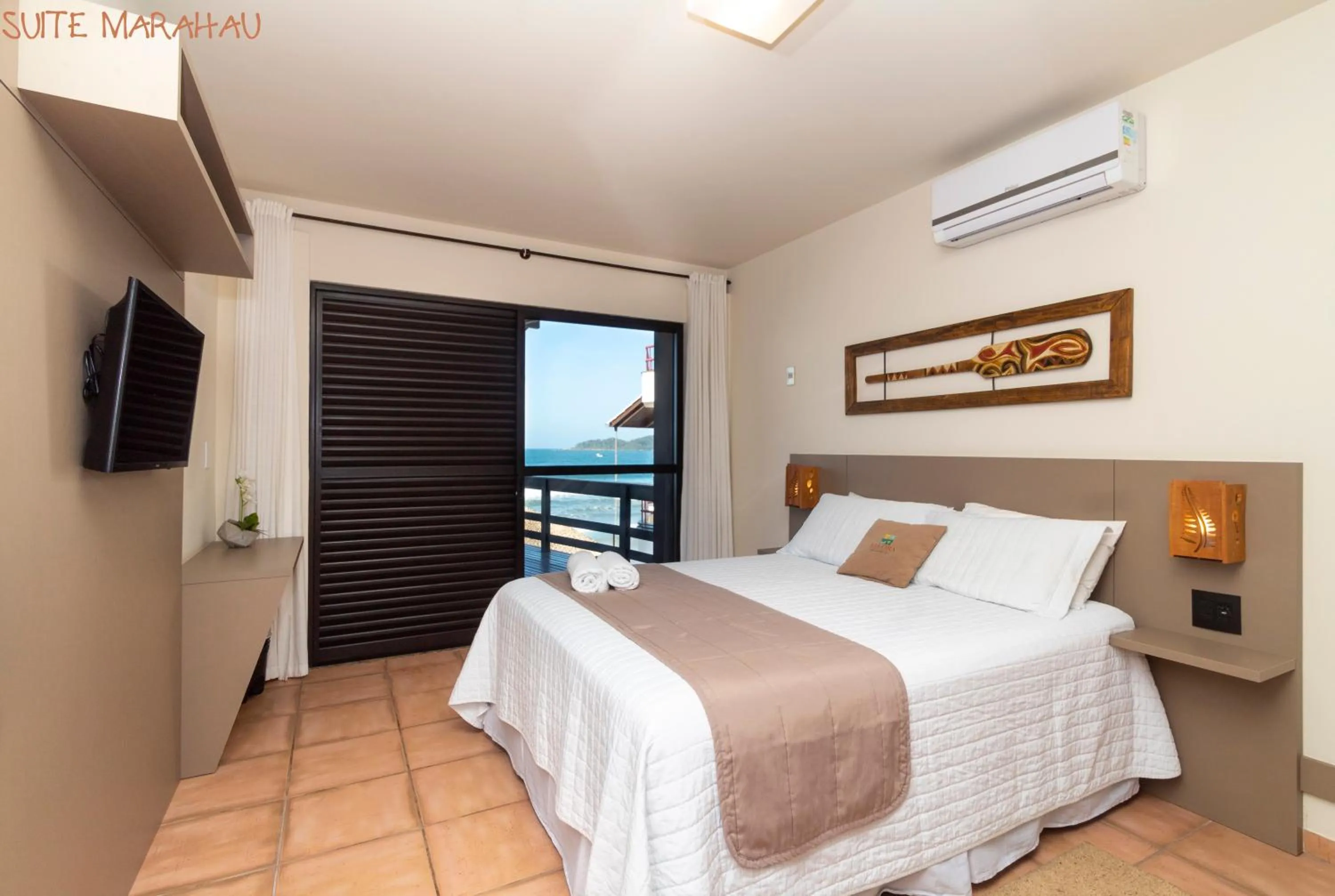 Bed in Pousada Kia Ora Bombinhas