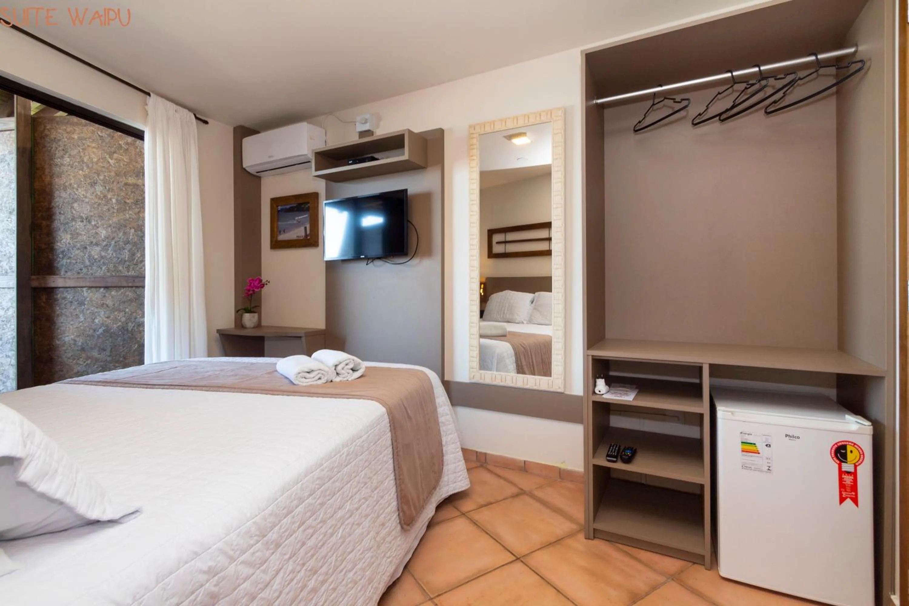 Bed in Pousada Kia Ora Bombinhas