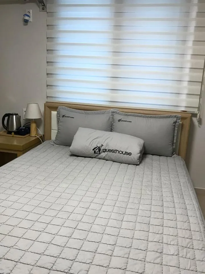 Bed in 24 Guesthouse Suncheon