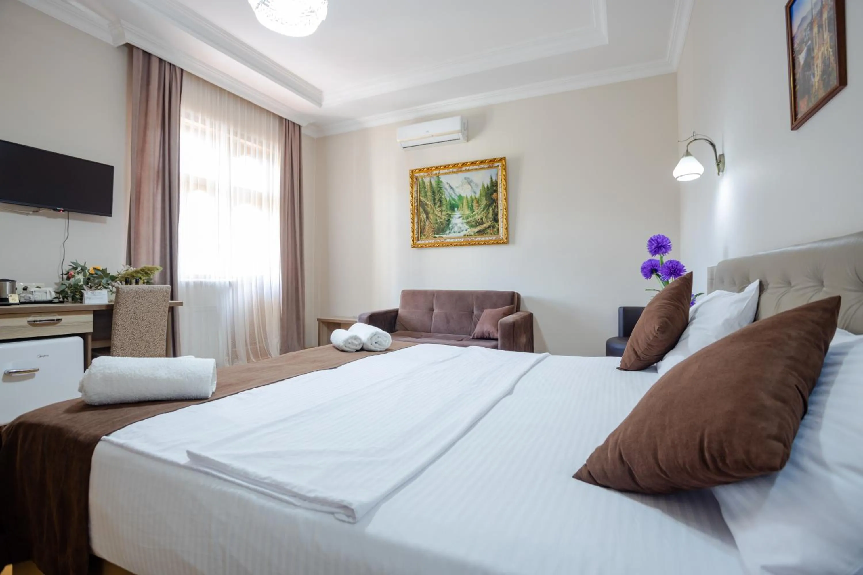 Bed in Daisi Sunset Hotel