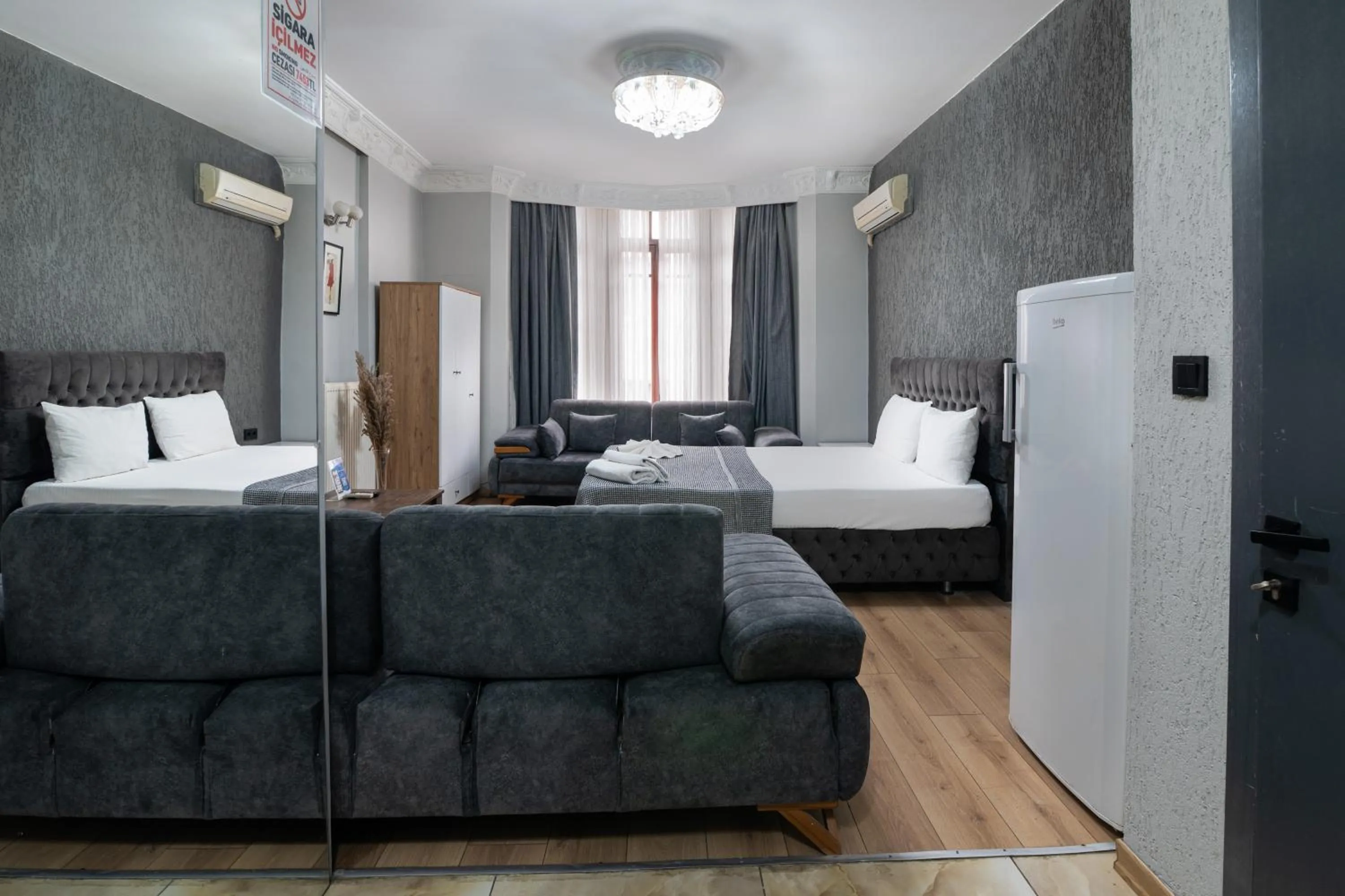 Seating area, Bed in Nest HOTEL Sisli