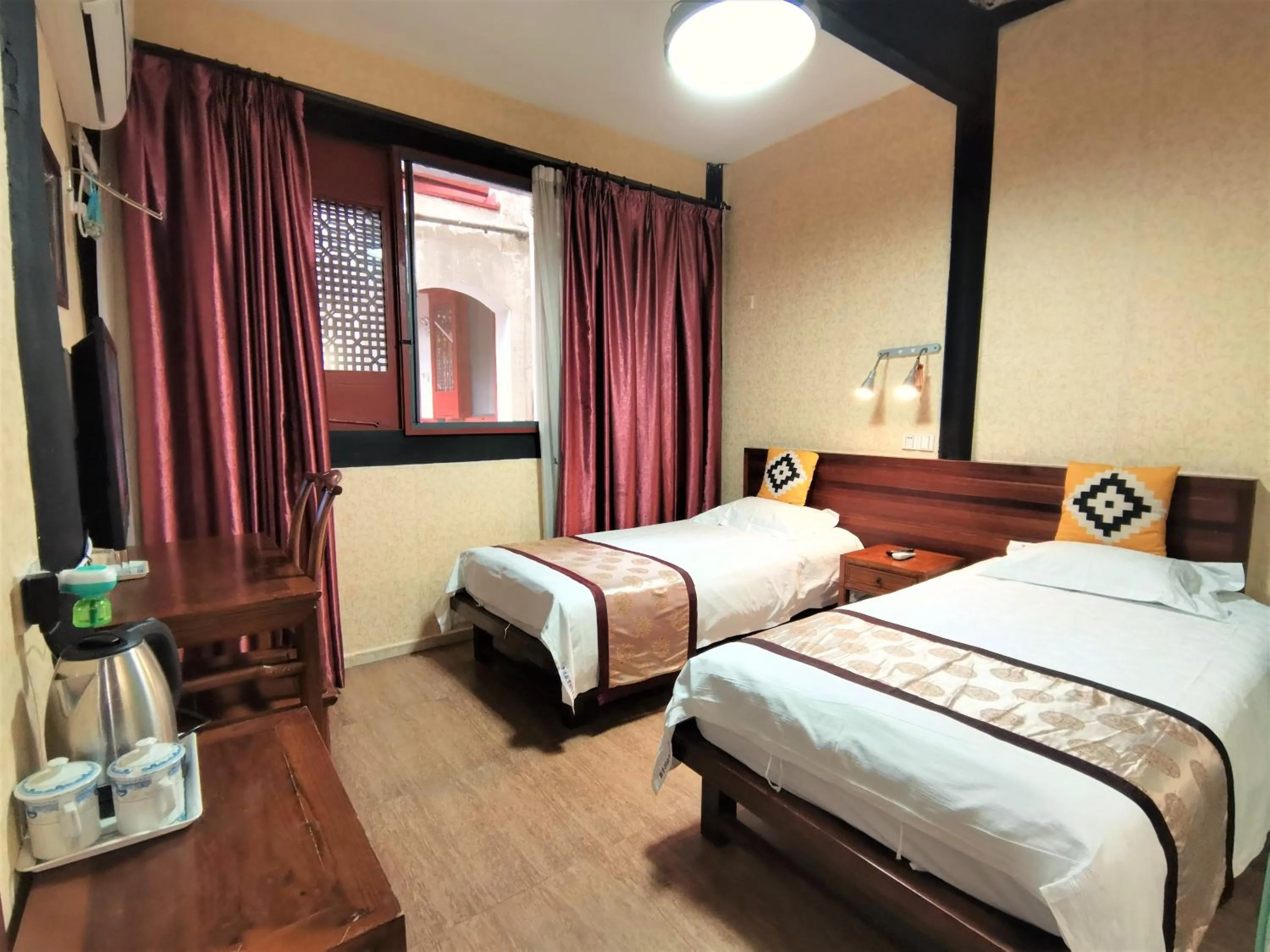 Bed in Shaoxing Laotaimen Luxun Native Place Youth Hostel