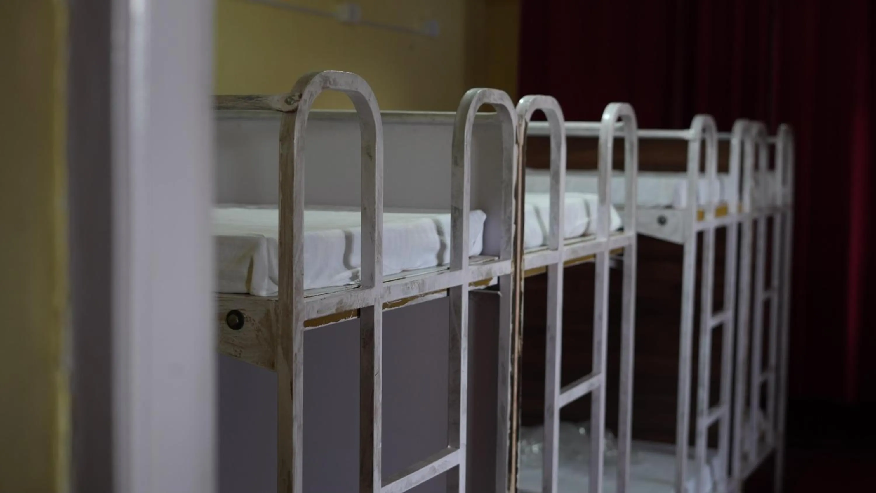 Bed in Satya Anand Cottage Pure Veg and Non Alcoholic Hotel