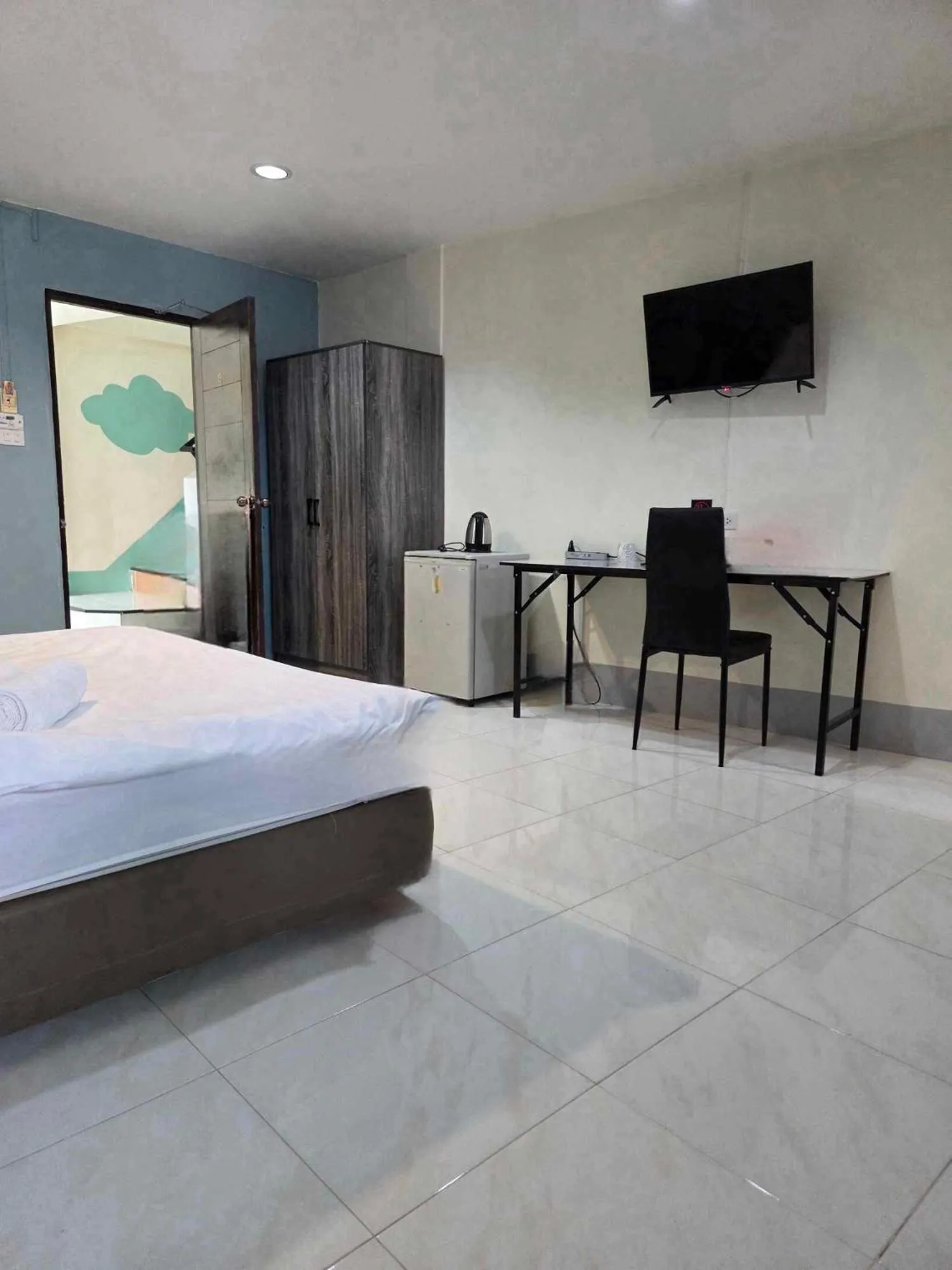 Seating area, Bed in City Inn Udonthani