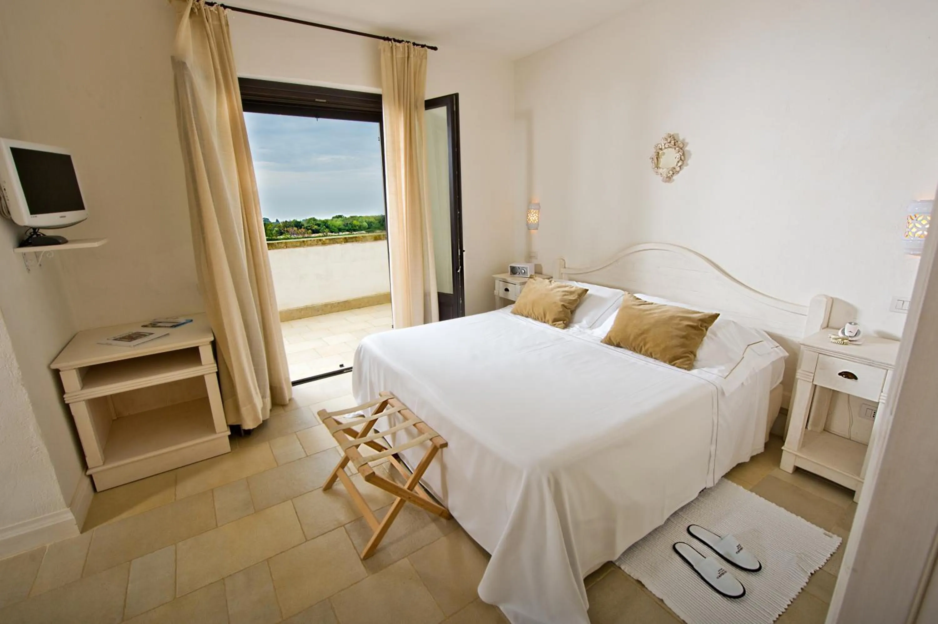 Photo of the whole room, Bed in Borgobianco Resort & Spa Polignano - MGallery Collection
